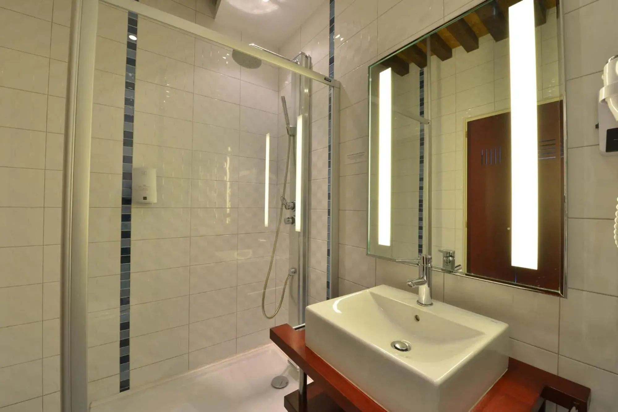Bathroom in Logis Hotel De La Cote D'or