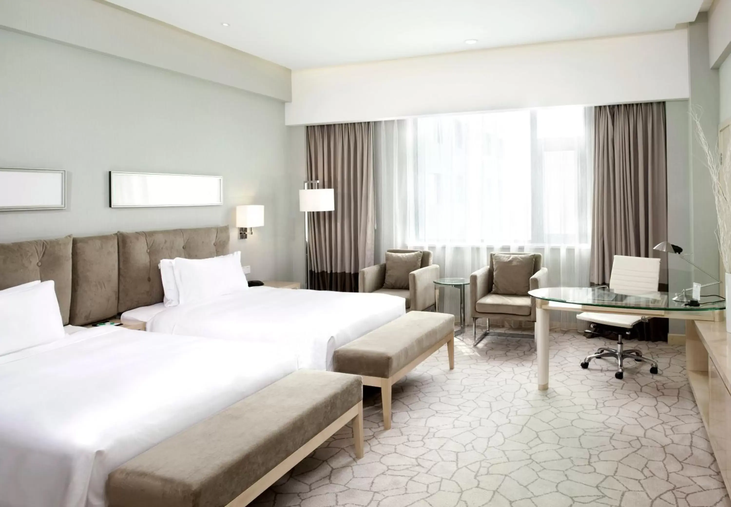 Bed in Holiday Inn Beijing Deshengmen, an IHG Hotel