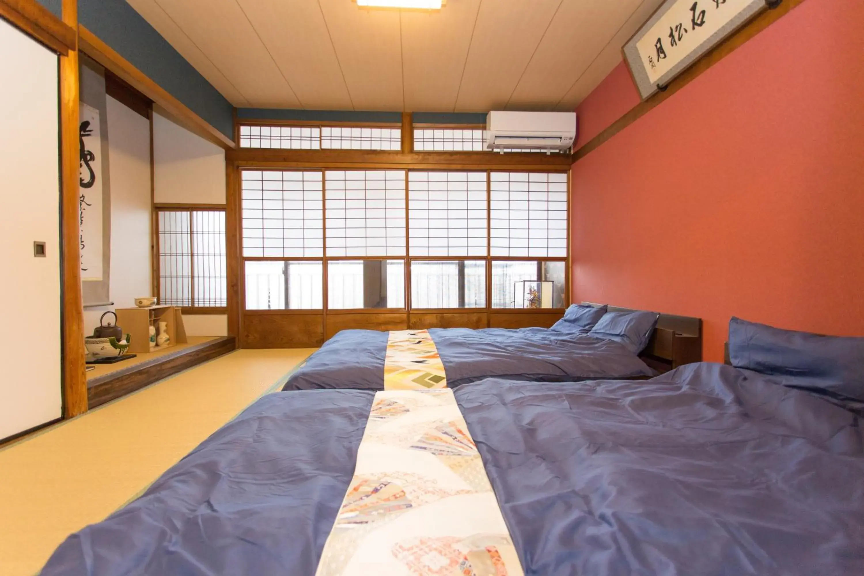 Bed in Guest House Kyorakuya Kinkakuji