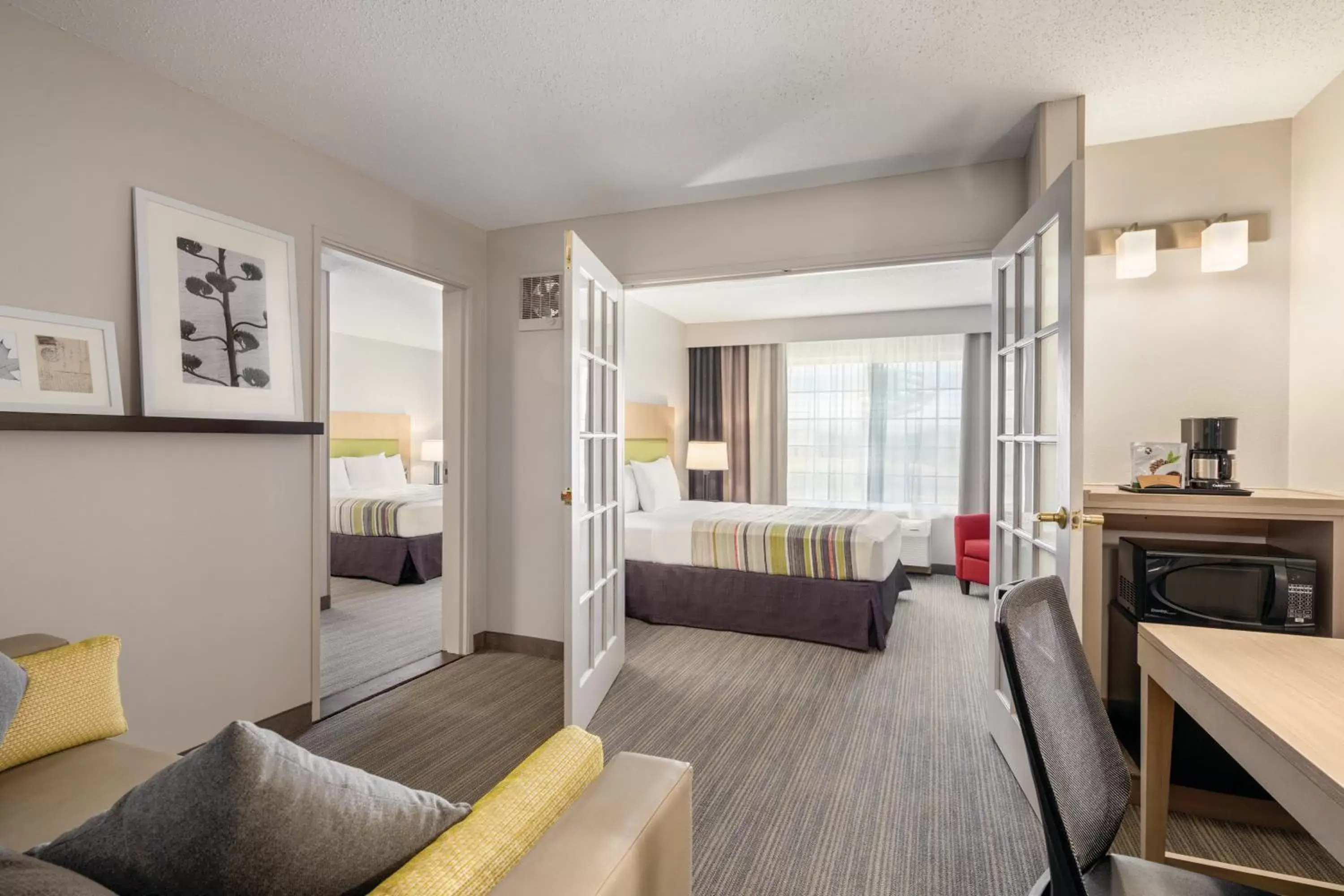 Living room, Seating Area in Country Inn & Suites by Radisson, Big Flats (Elmira), NY