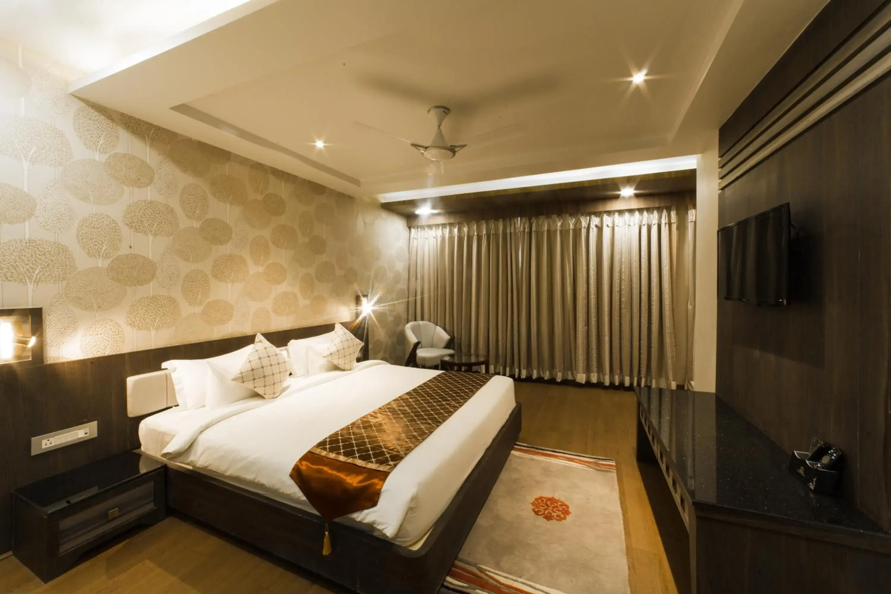 Bed in Costa Riviera Hotel