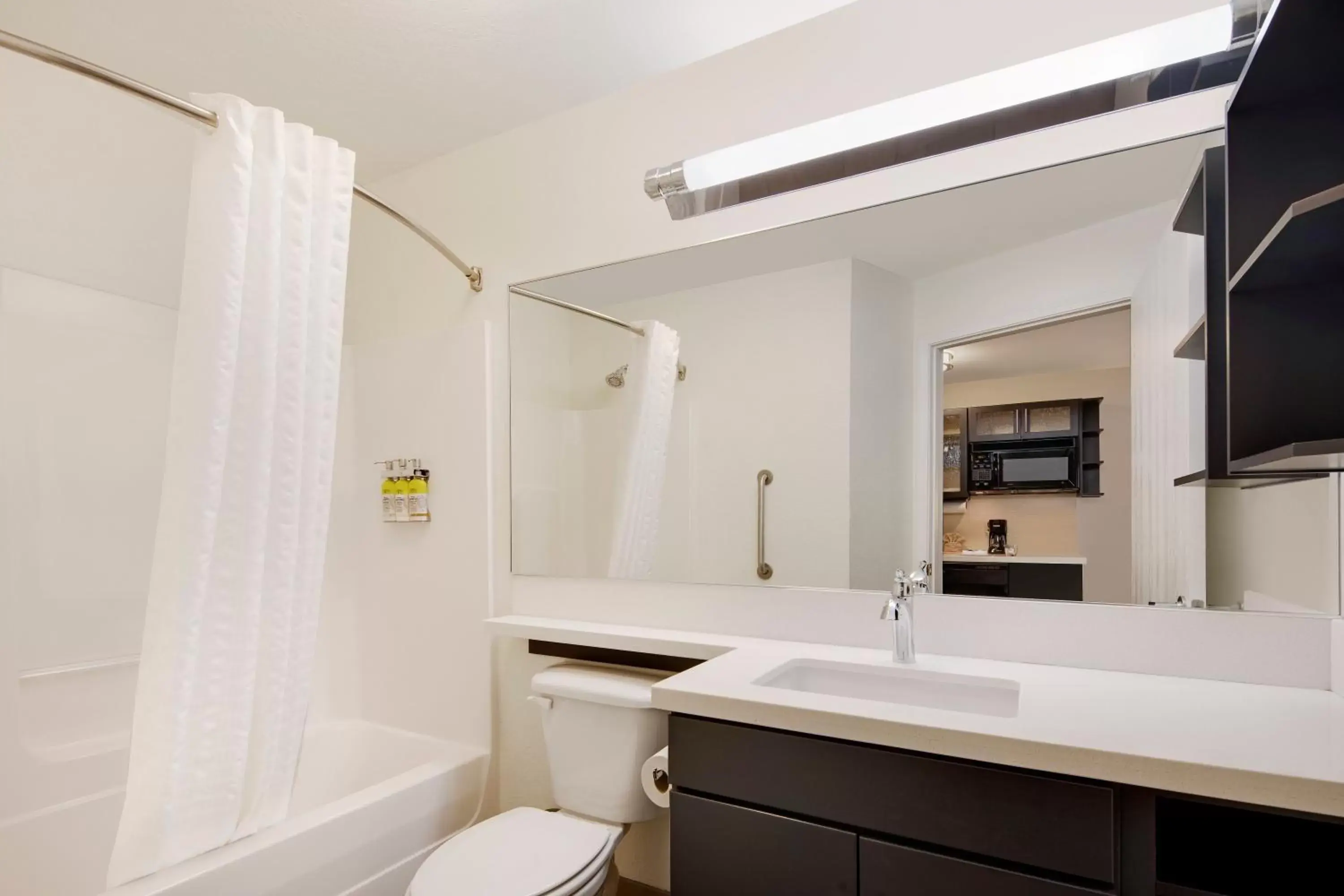 Photo of the whole room, Bathroom in Candlewood Suites Rogers-Bentonville, an IHG Hotel