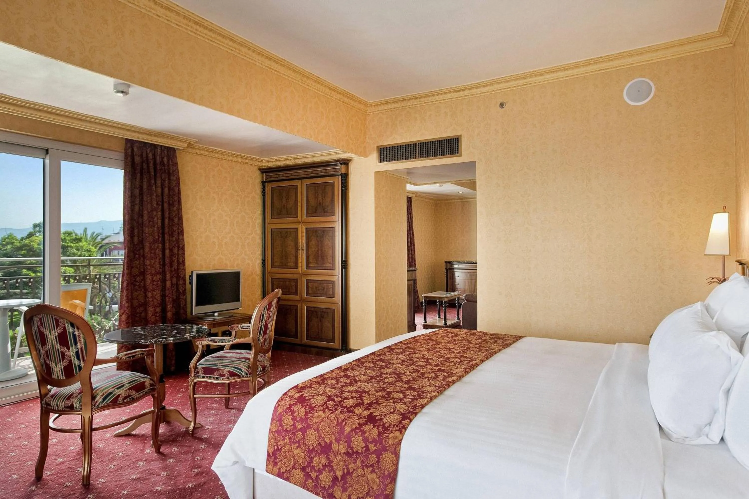 Photo of the whole room, Bed in Delta Hotels by Marriott Giardini Naxos