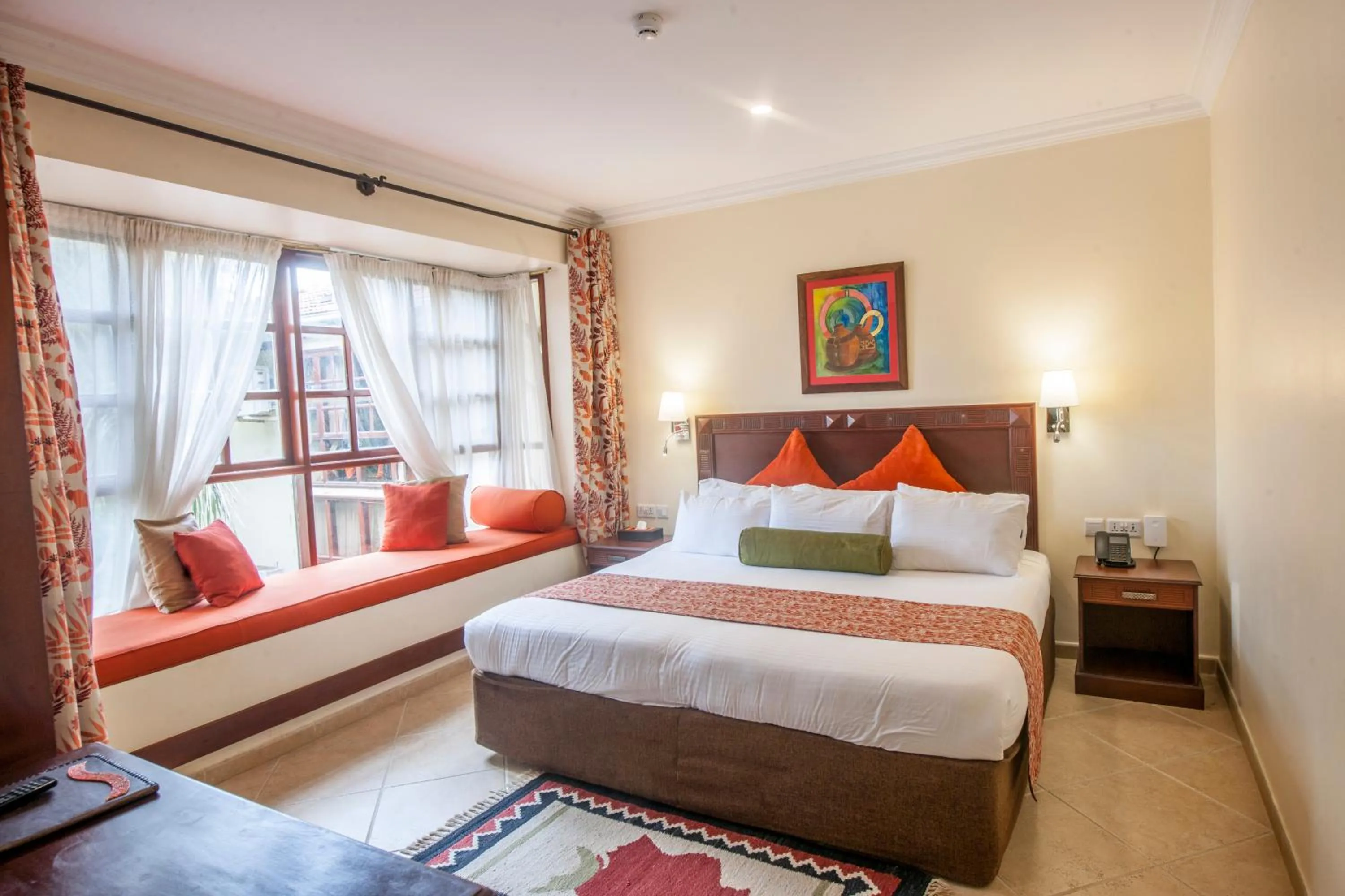 Bedroom, Bed in African Tulip Hotel