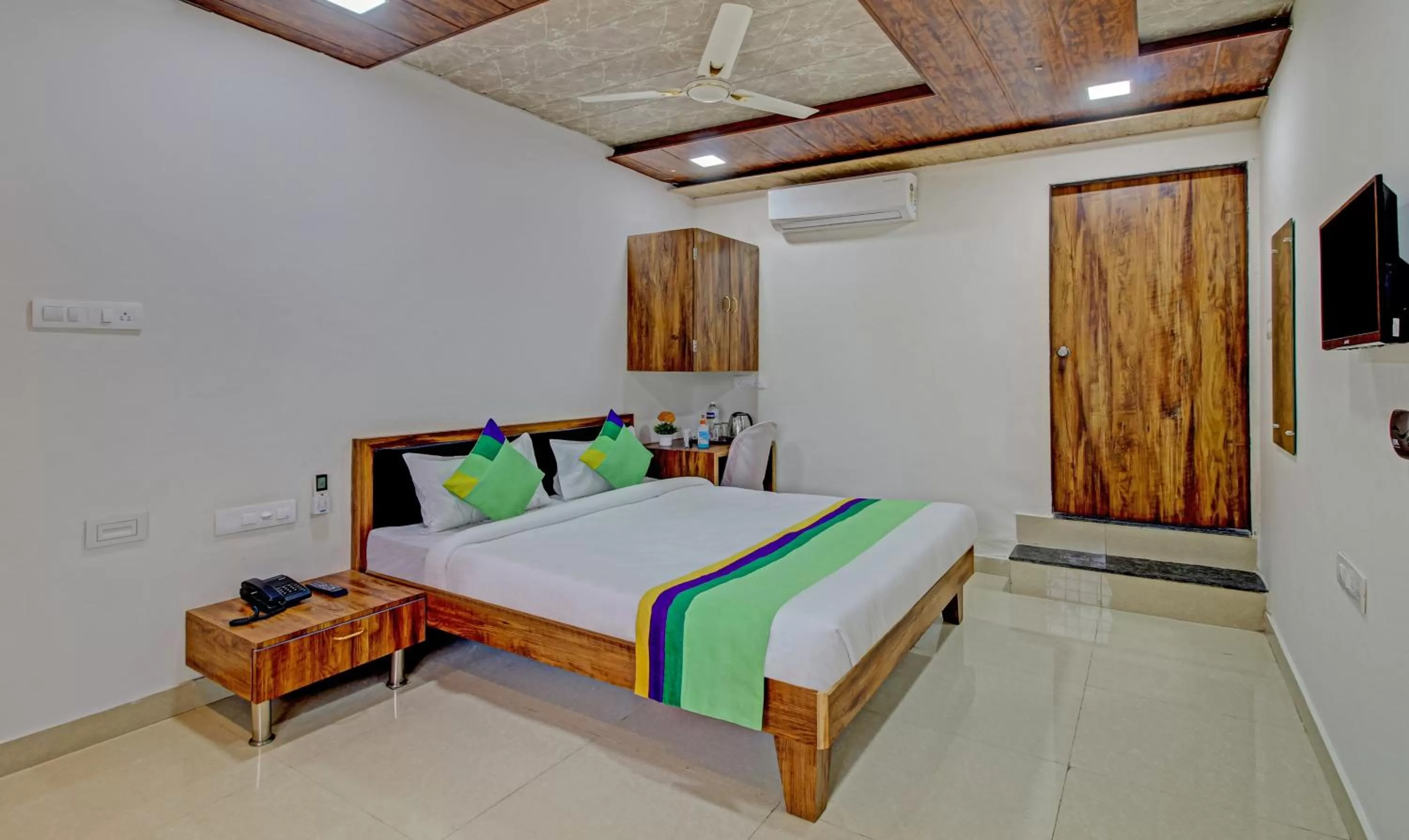 Bed in Sai Samrat Resort