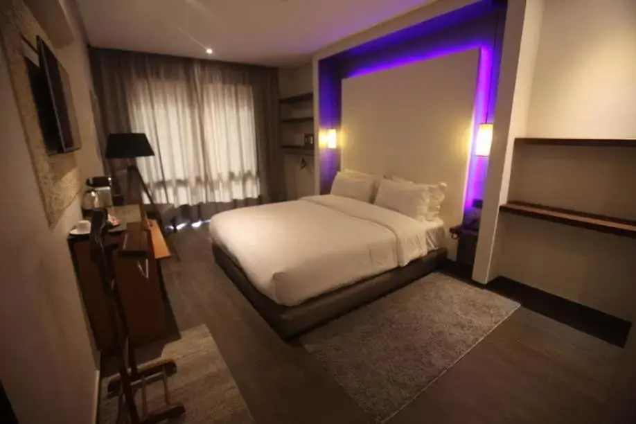 Bed in The Seven Hotel