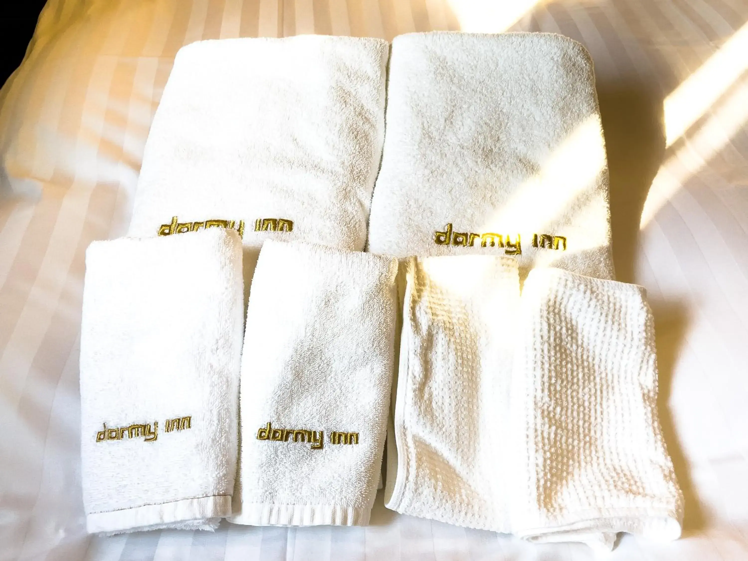 towels, Bed in Dormy Inn Premium Tokyo Kodenmacho