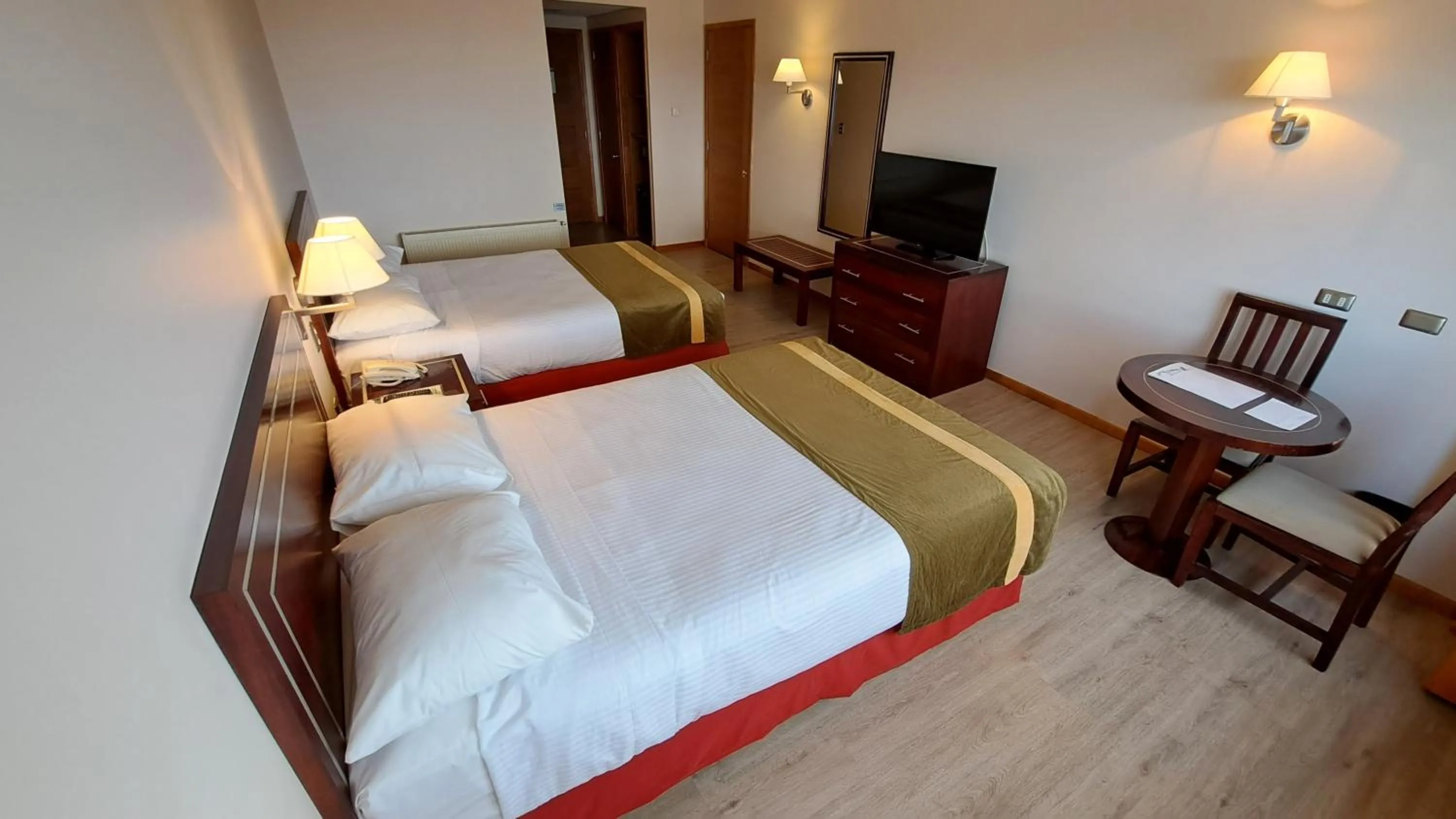 Bed in Hotel Diego de Almagro Punta Arenas