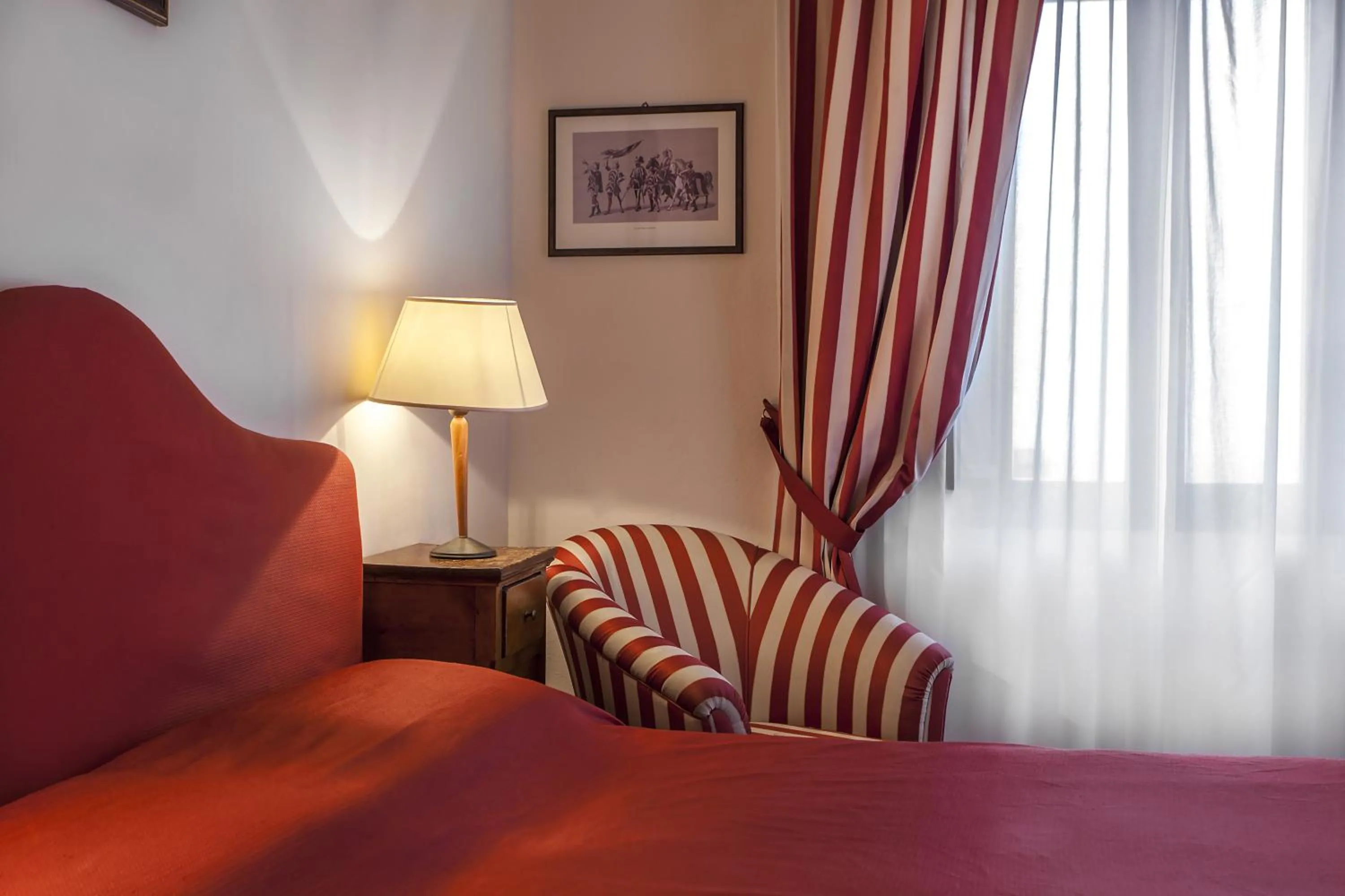 Seating area, Bed in Il Chiostro Del Carmine