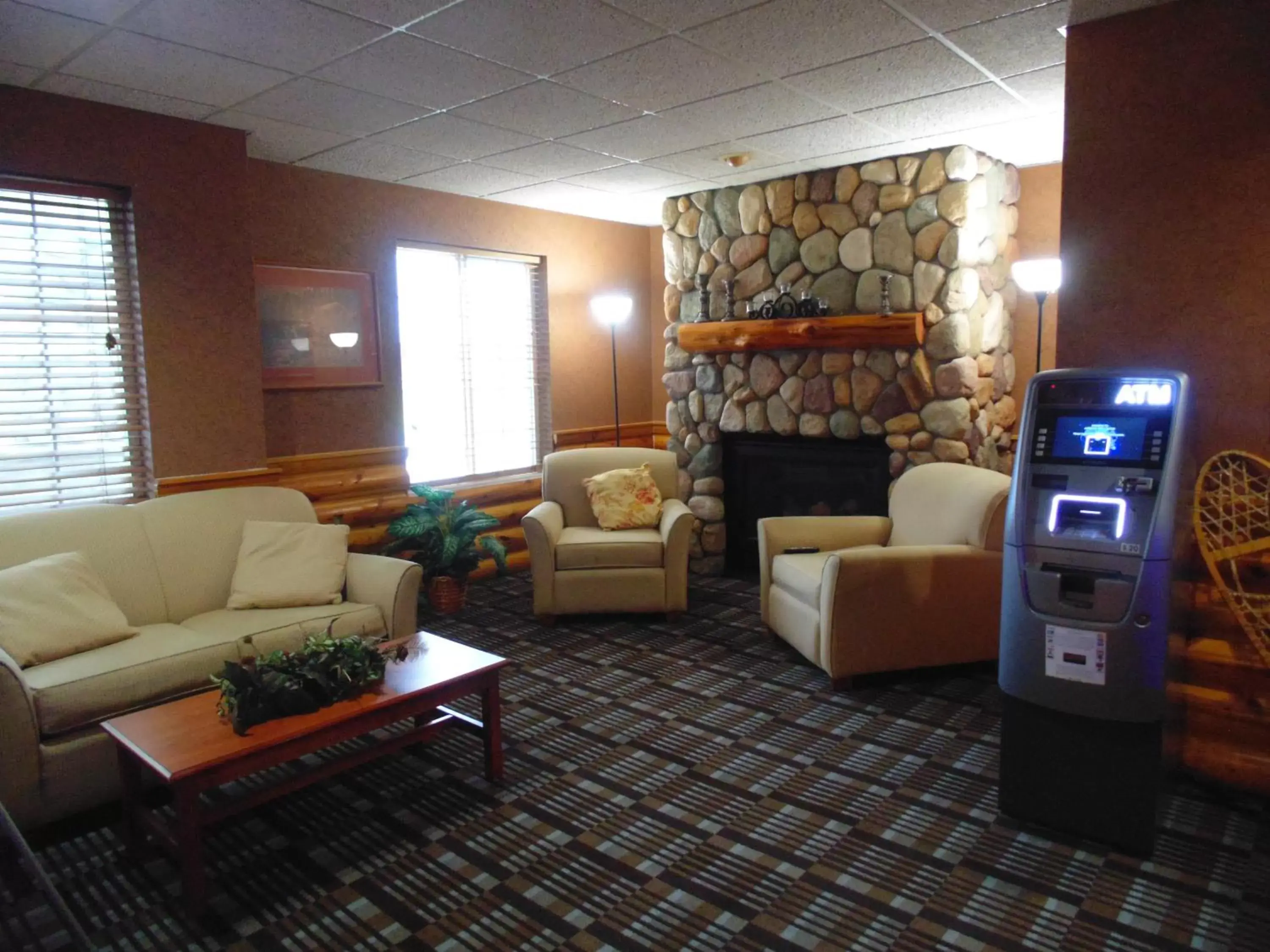 Seating Area in American Inn and Suites Houghton Lake