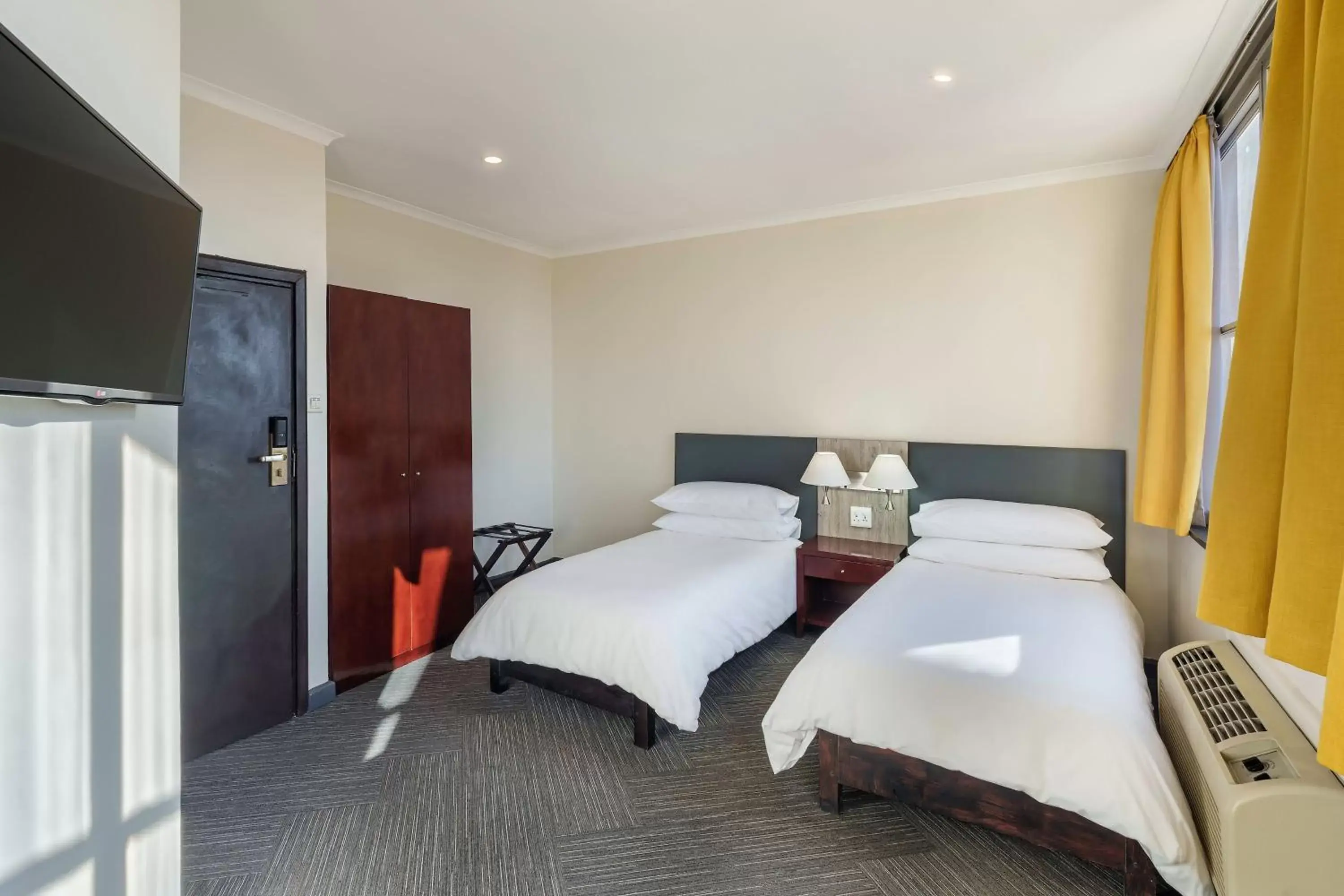 Photo of the whole room, Bed in Protea Hotel by Marriott Lusaka Cairo Road