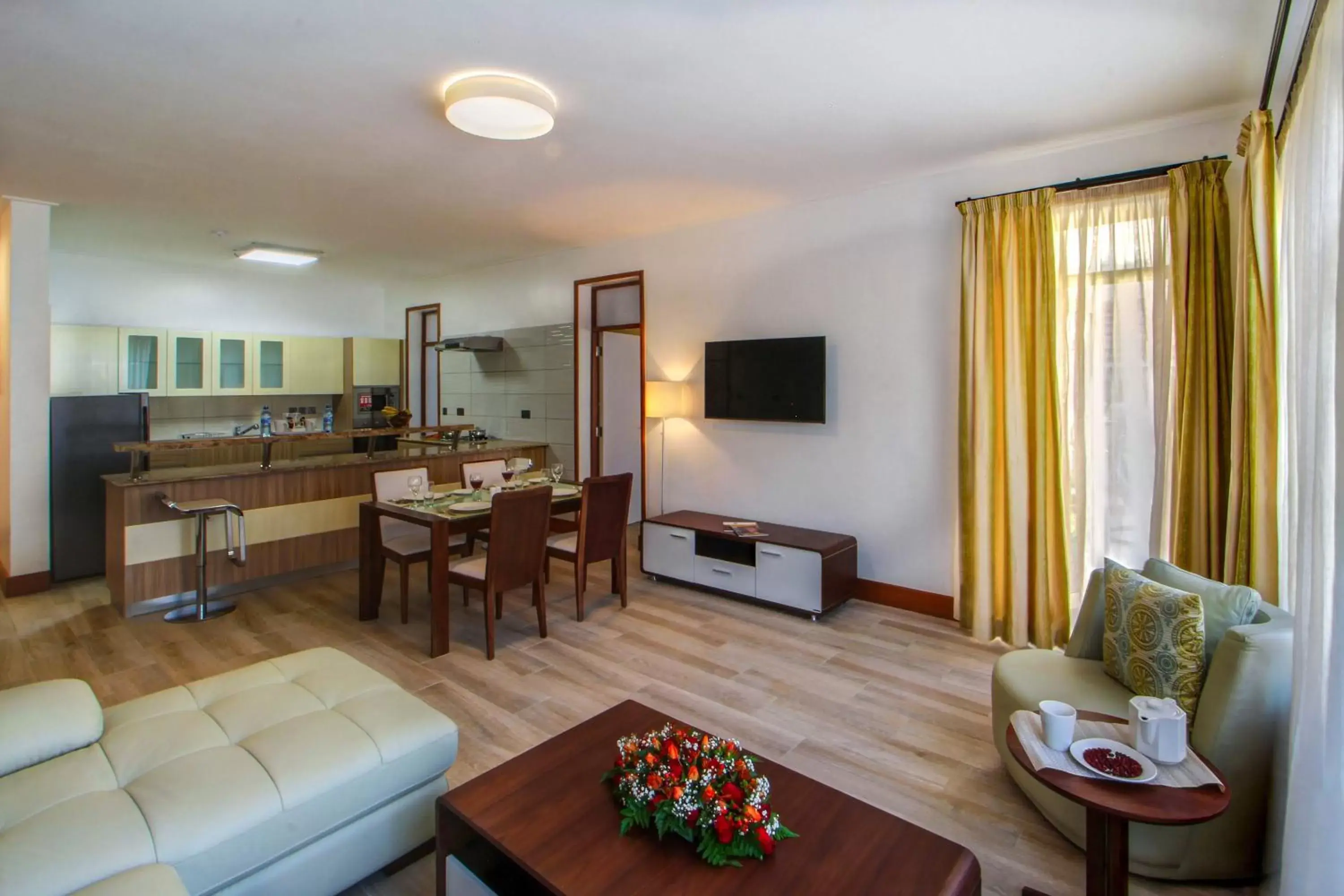 TV and multimedia, Seating Area in Executive Residency by Best Western Nairobi