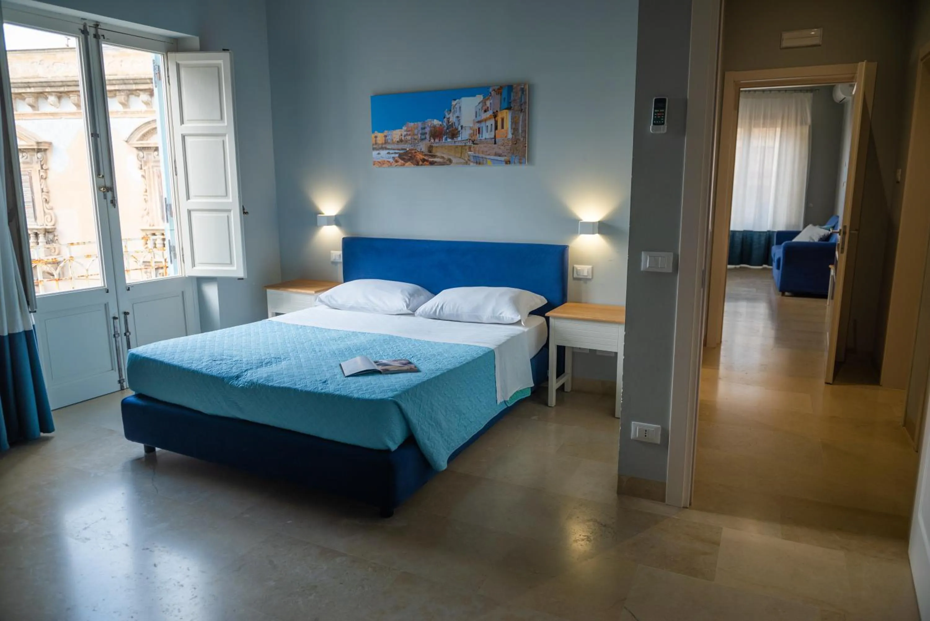 Photo of the whole room, Bed in ZIBIBBO SUITES & ROOMS - Aparthotel in Centro Storico a Trapani