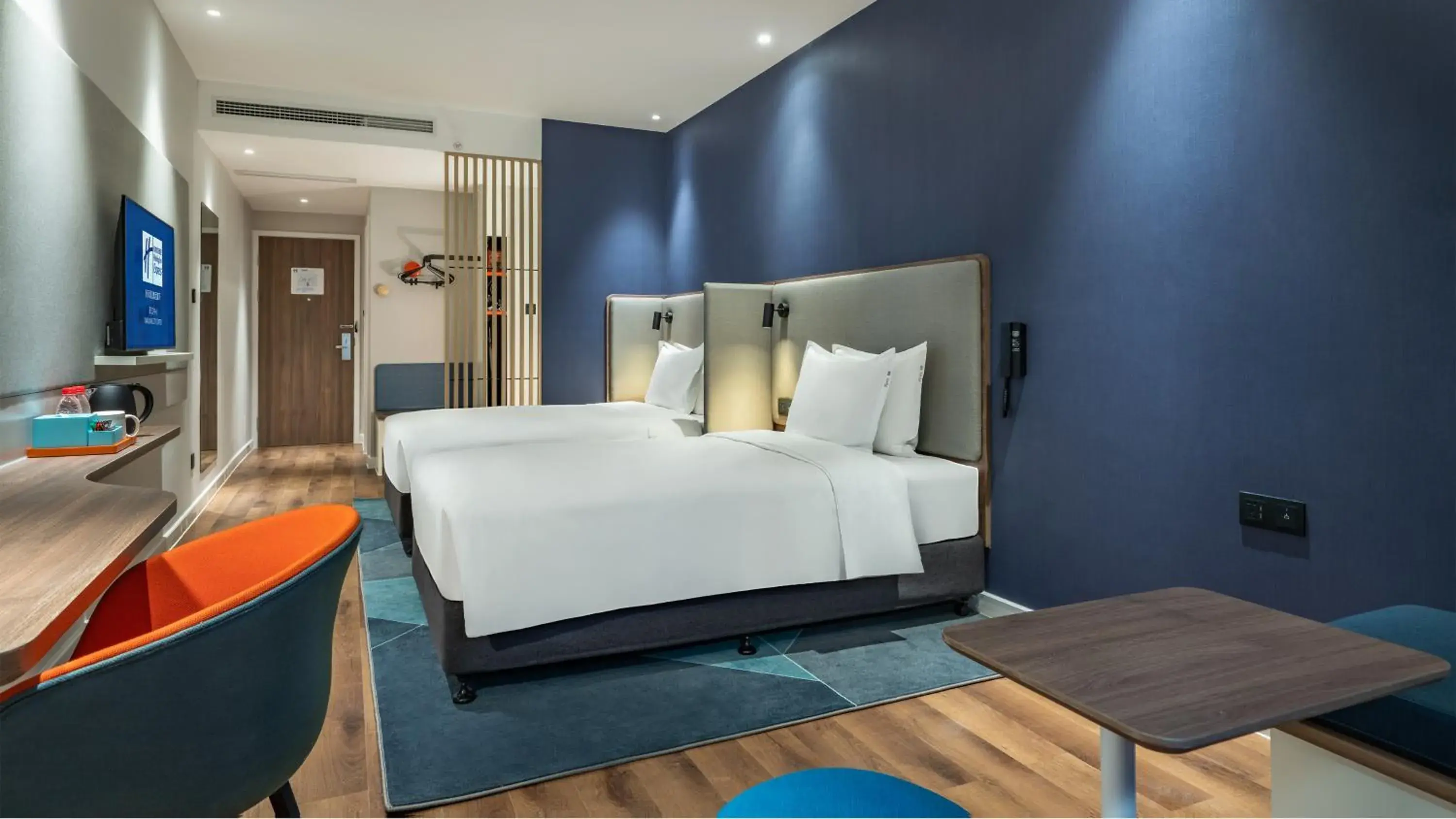 Bed in Holiday Inn Express Yangjiang City Center, an IHG Hotel