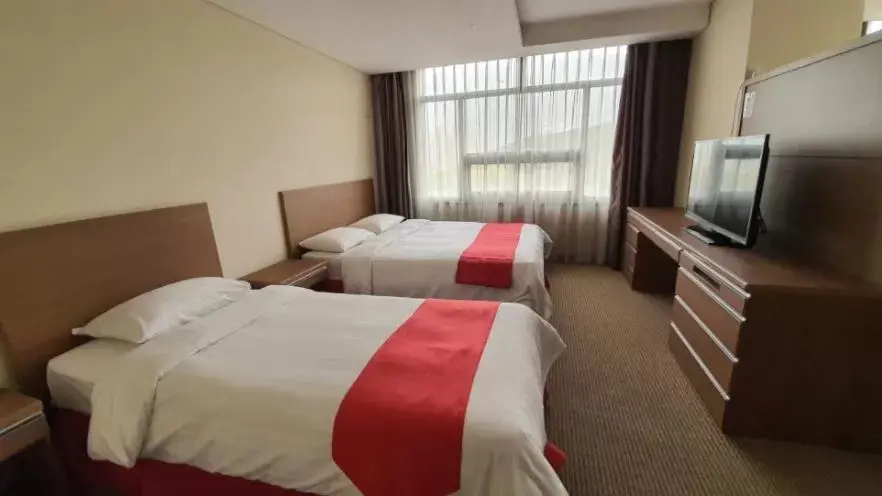 Bed in Ramada Hotel Dongtan