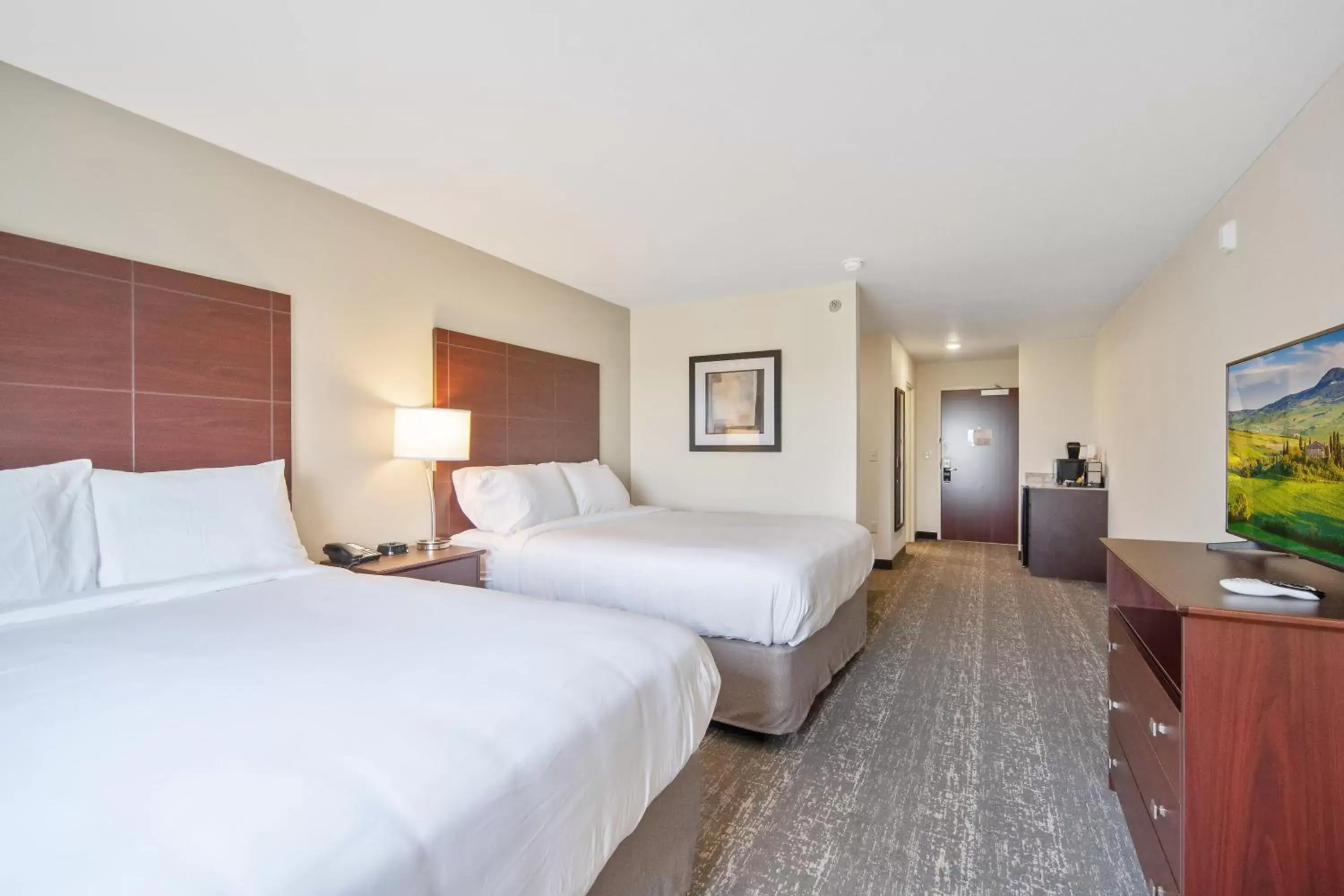 Bed in Cobblestone Hotel & Suites - Austin