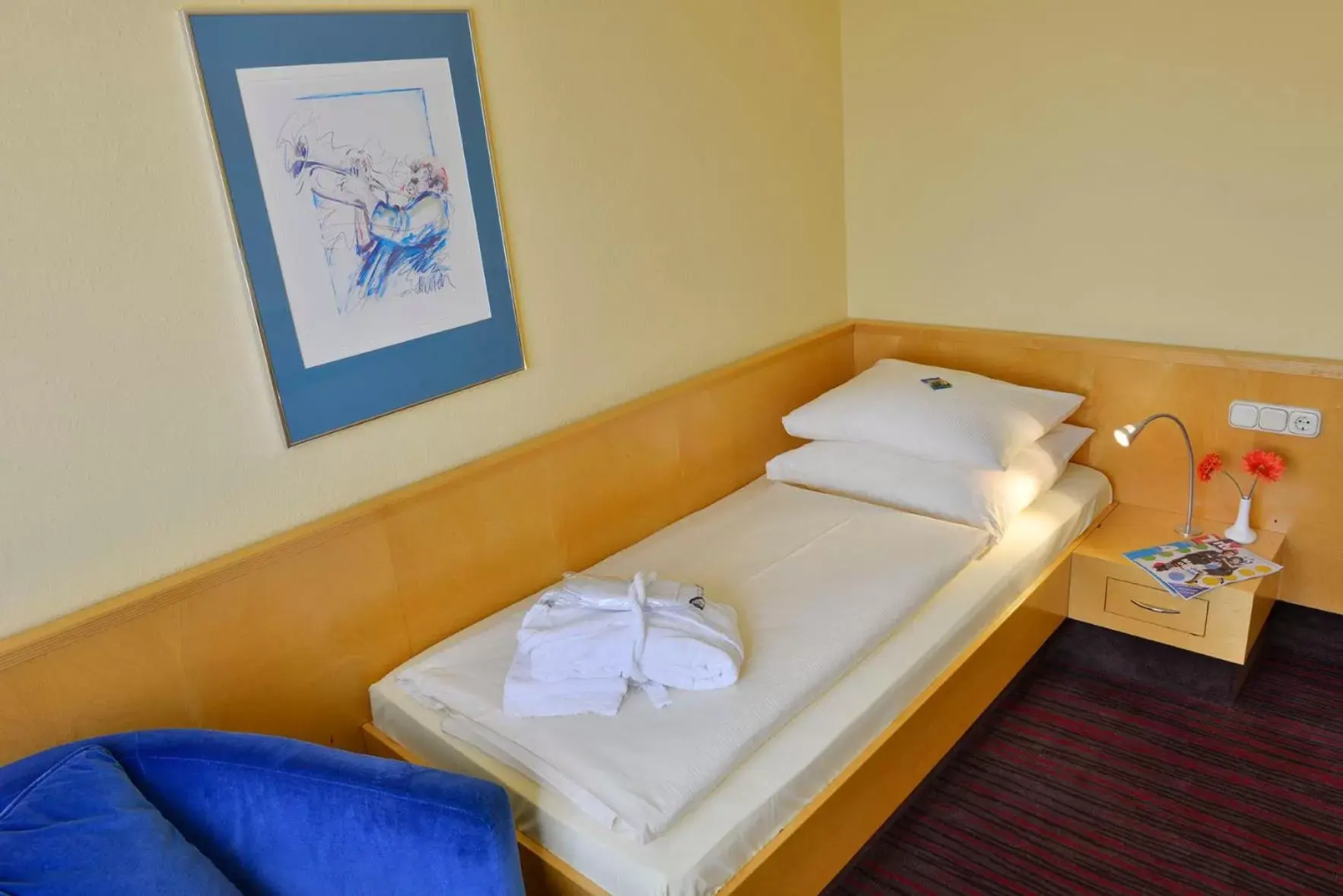 Bed in ACHAT Hotel Lüneburger Heide