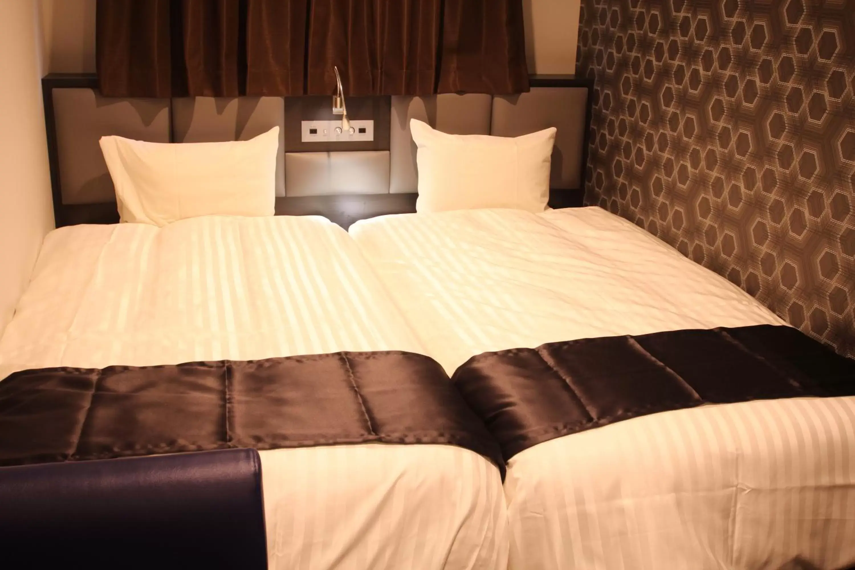 Photo of the whole room, Bed in Hotel Hulaton Fukuokahakata