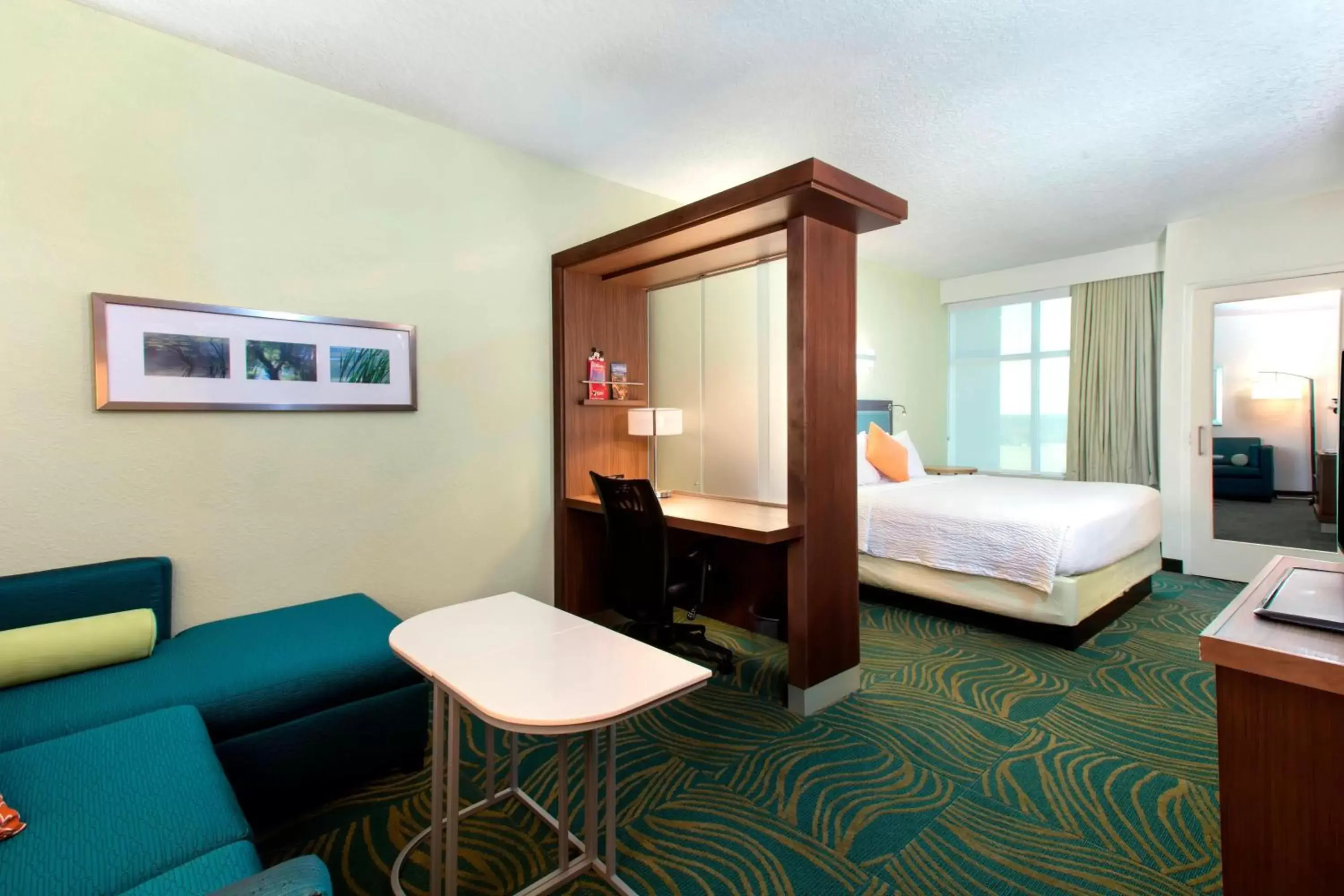 Bedroom in SpringHill Suites by Marriott Orlando at FLAMINGO CROSSINGS Town Center-Western Entrance