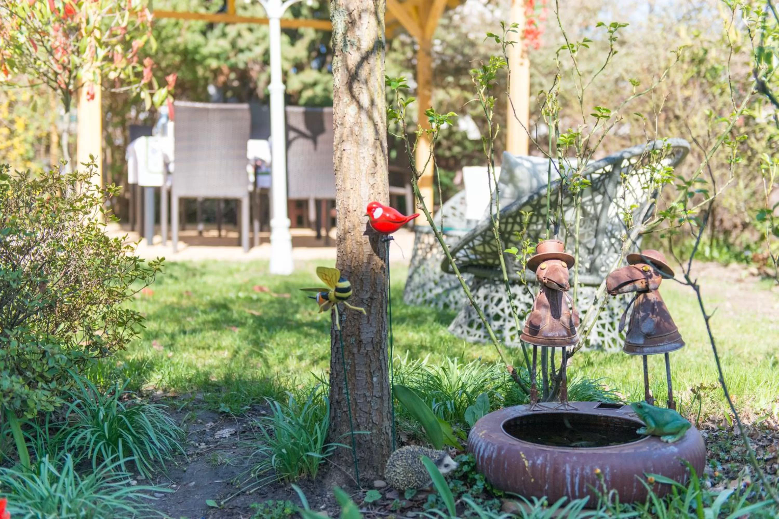 Garden in Maison d'hôtes Aux Deux Cigognes