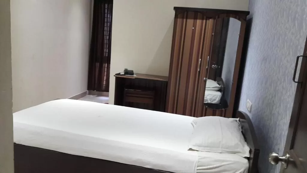 Bed in Star MSR Residency