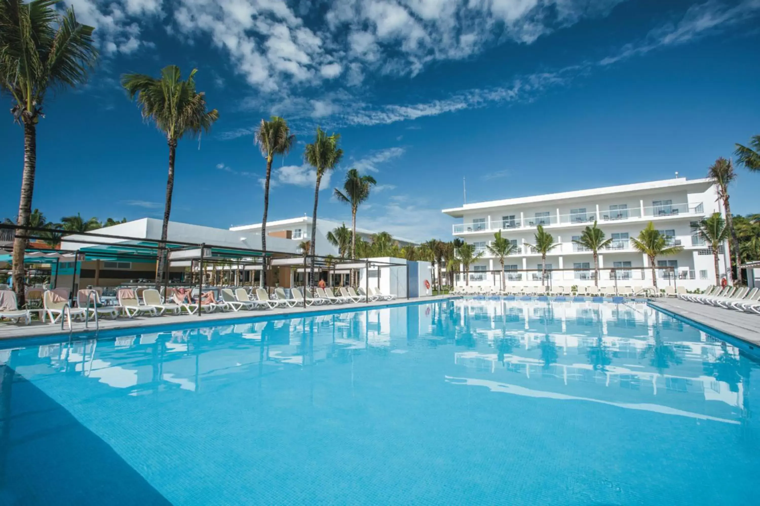 Swimming pool in Riu Playacar - All Inclusive Swimming pool in Riu Playacar - All Inclusive