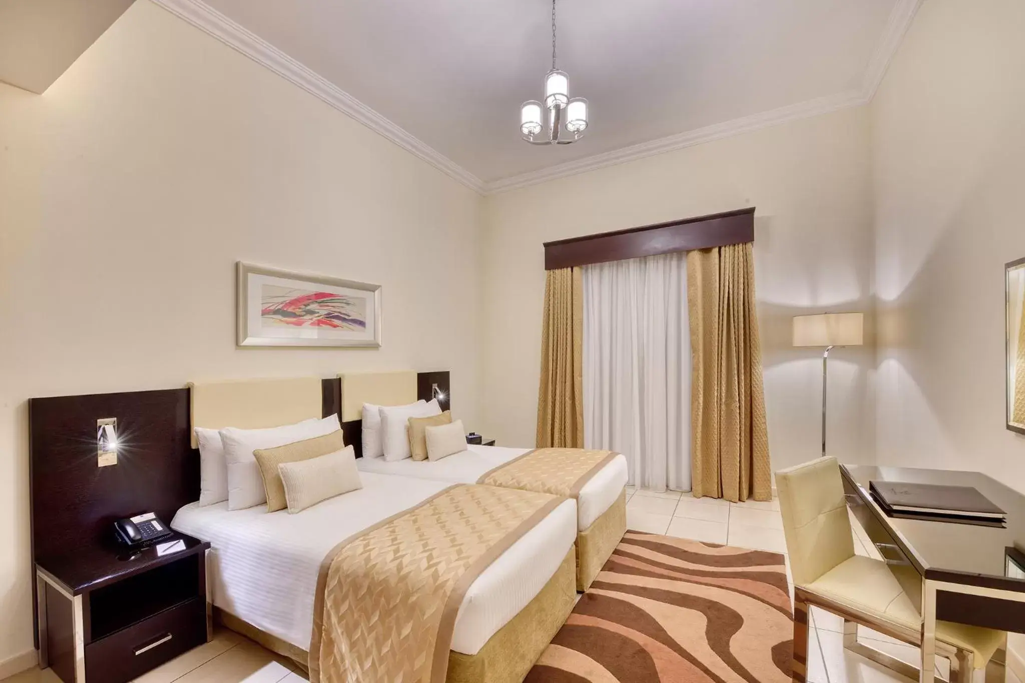 Bed in Pearl Marina Hotel Apartments