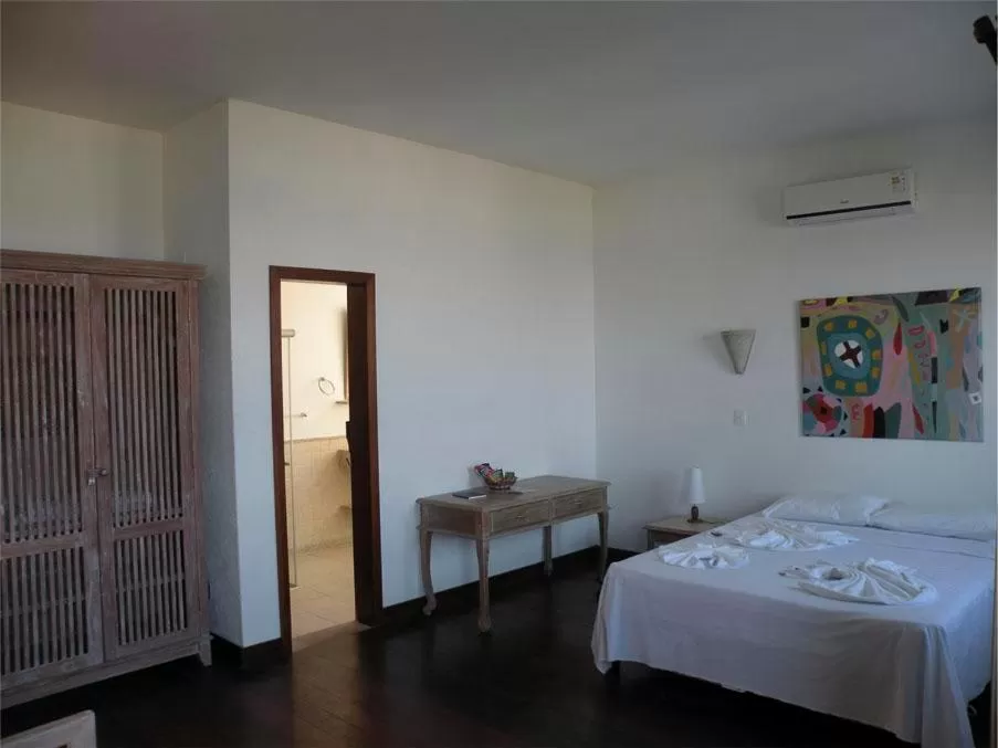 Photo of the whole room, Bed in Pousada Jataí