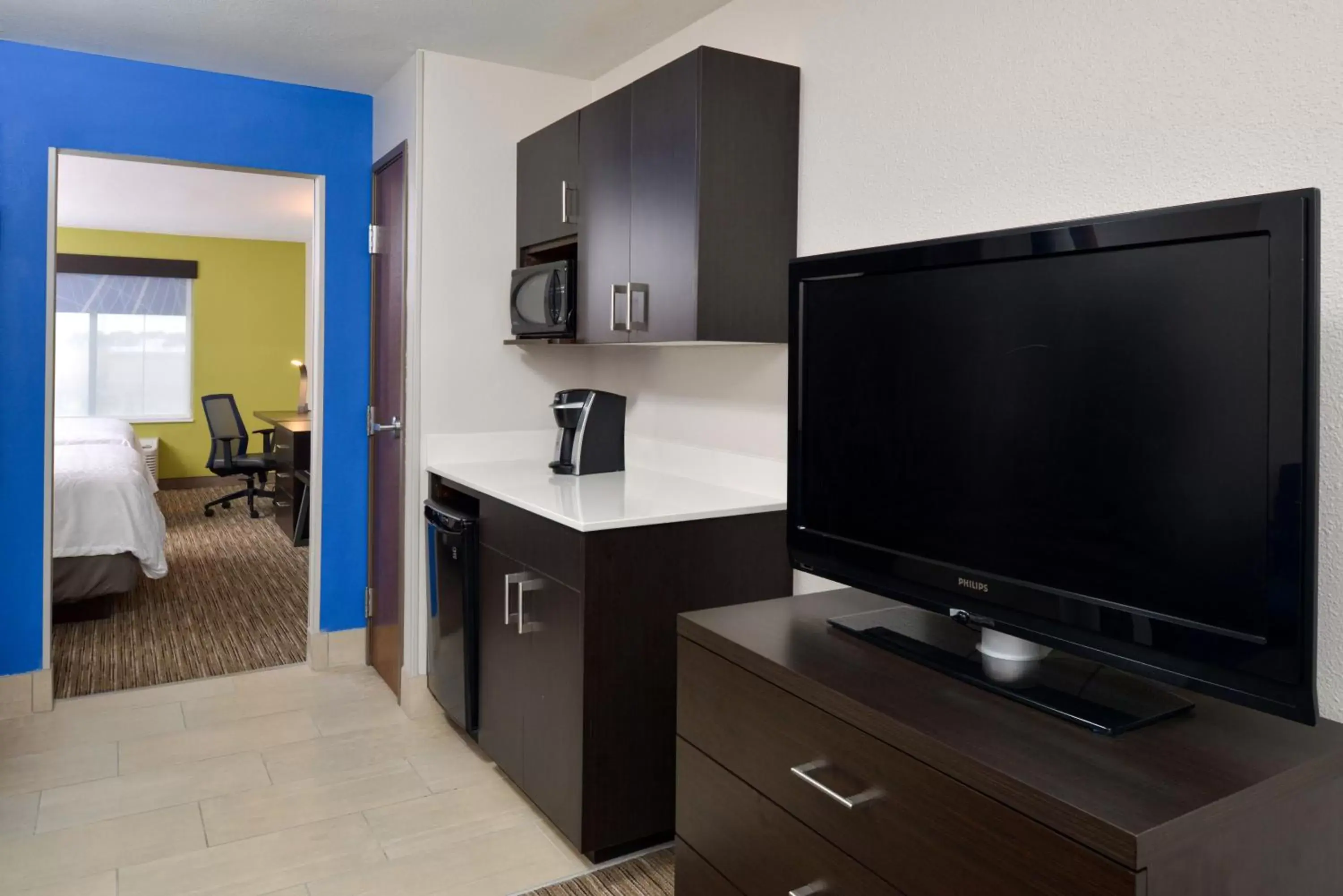 Photo of the whole room, TV/Entertainment Center in Holiday Inn Express & Suites Pueblo, an IHG Hotel