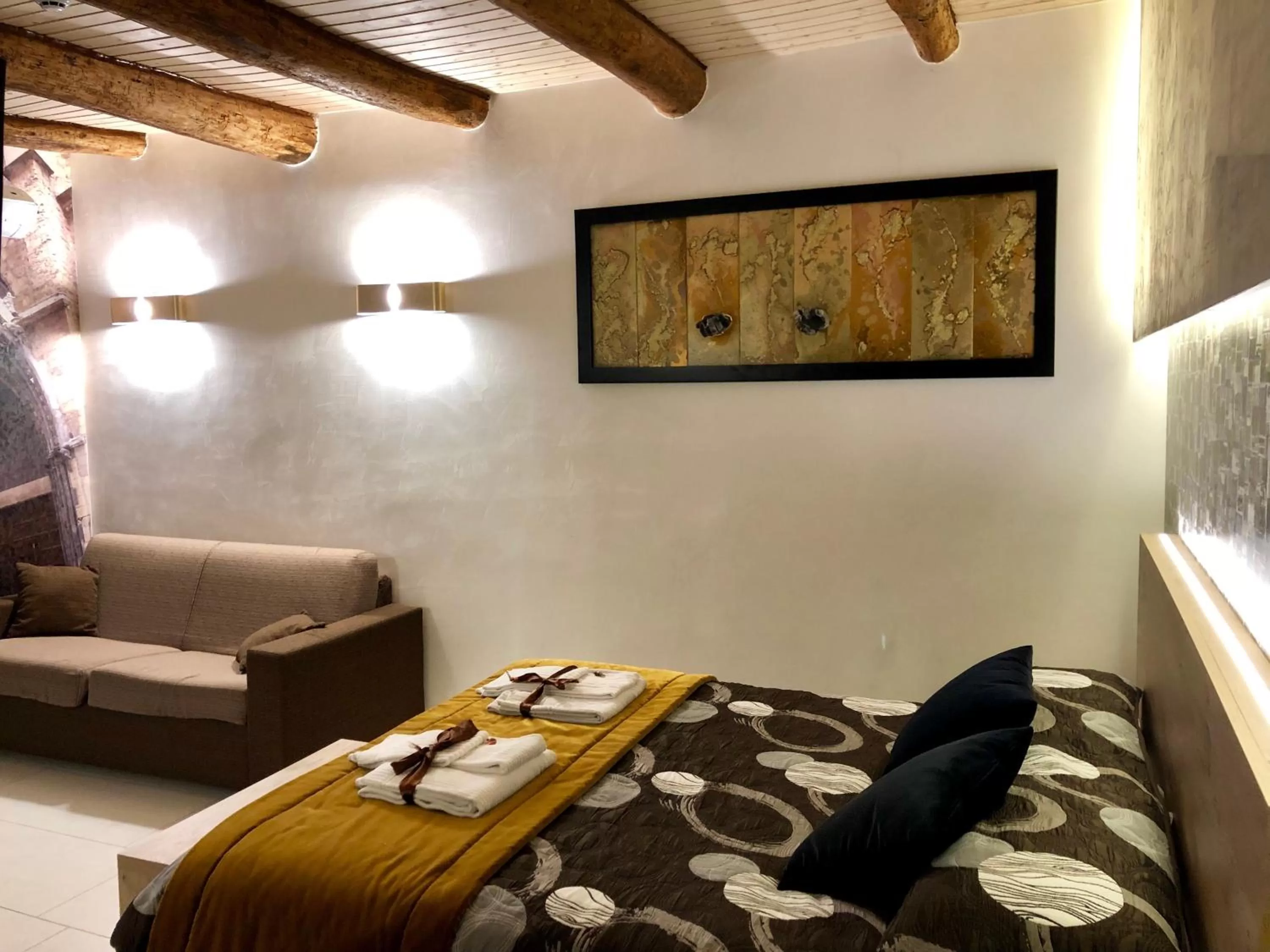 Bed in Relais Piazza Del Plebiscito B&B