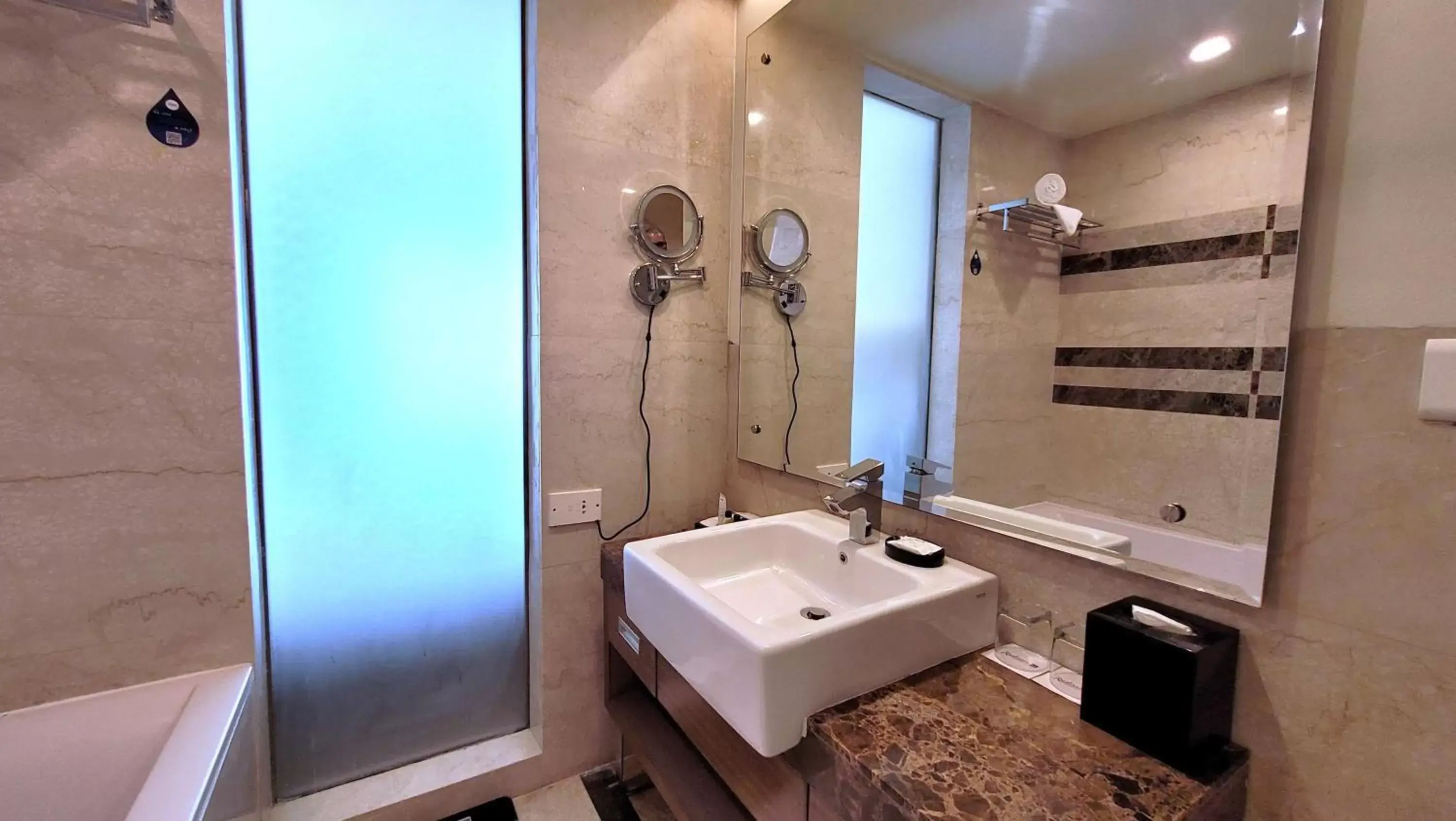 Bathroom in Radisson Blu Hotel, Greater Noida