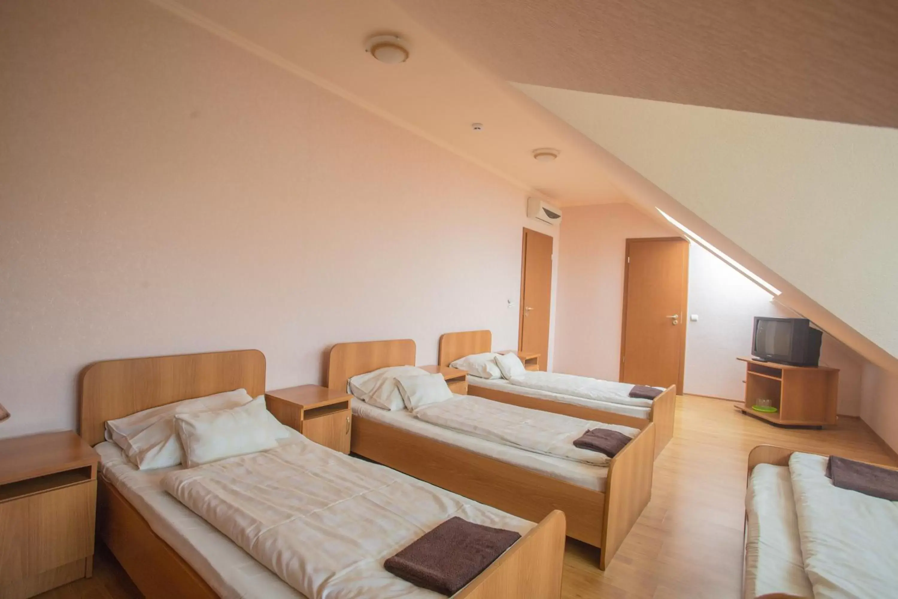 Classic Triple Room in Praktik Hotel & Restaurant Classic Triple Room in Praktik Hotel & Restaurant