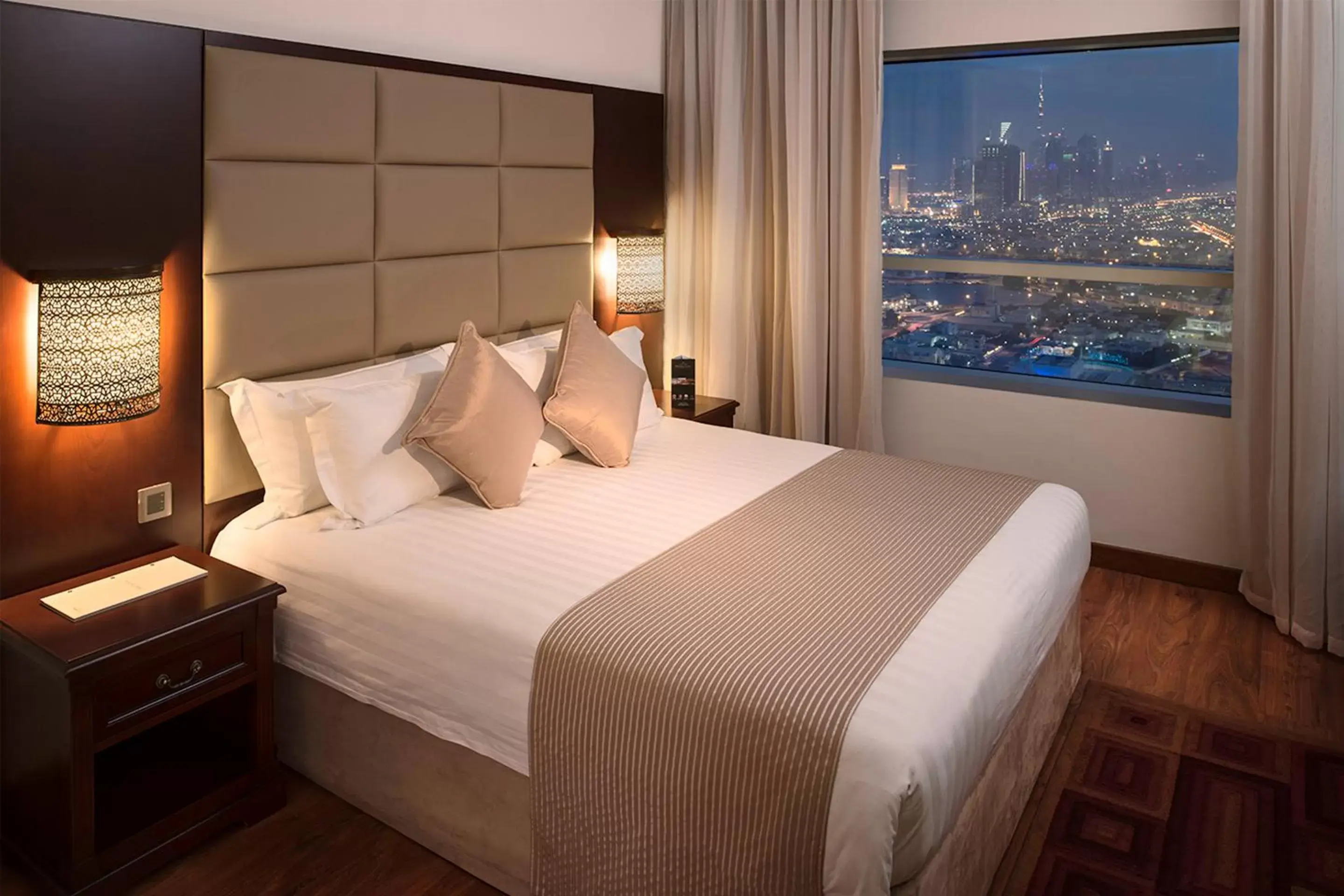 City view, Bed in Majestic City Retreat Hotel