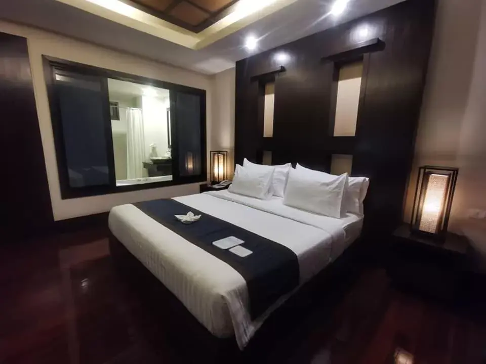 Bed in Yodia Heritage Hotel