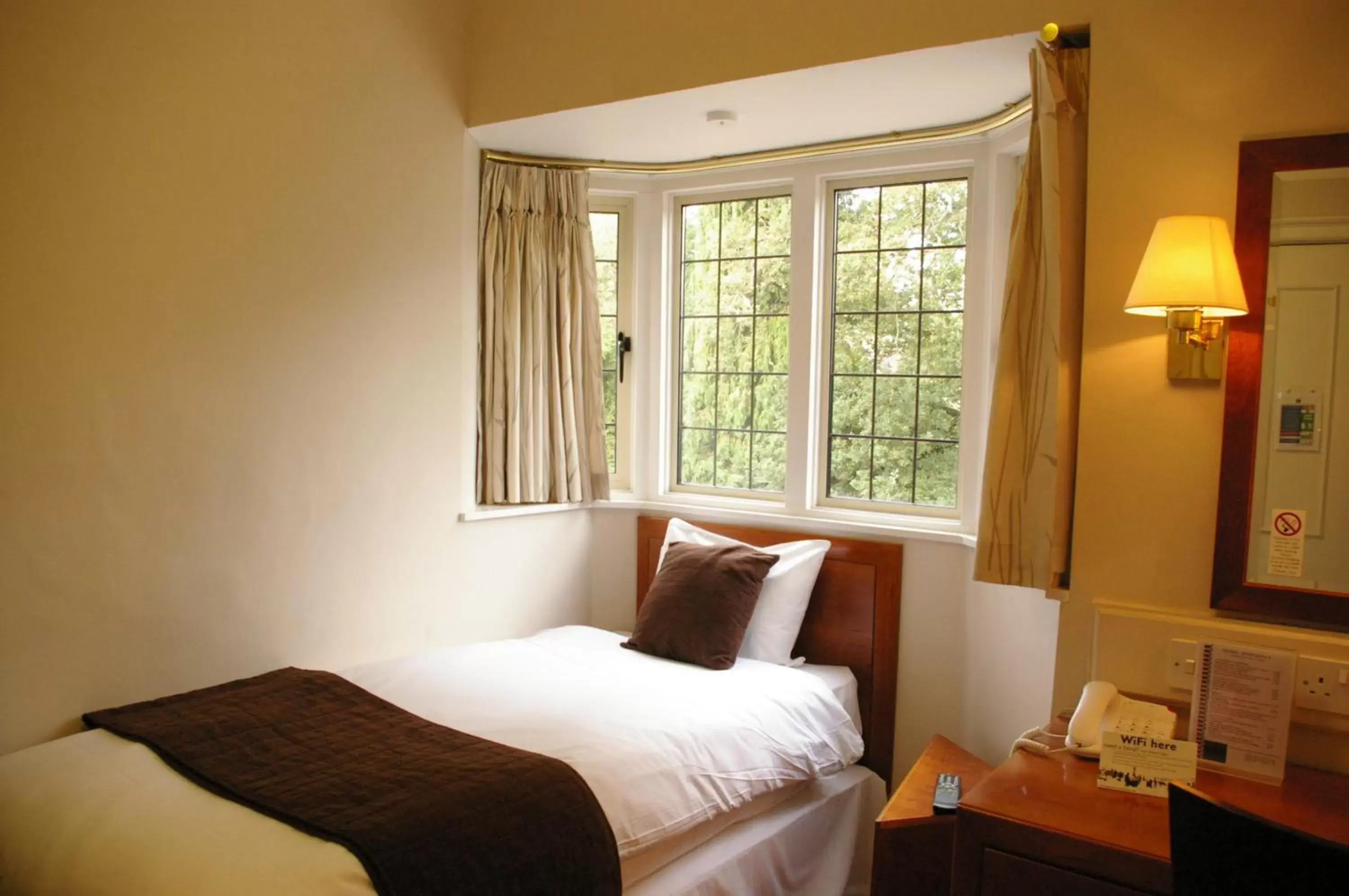 Bed in Farnham House Hotel