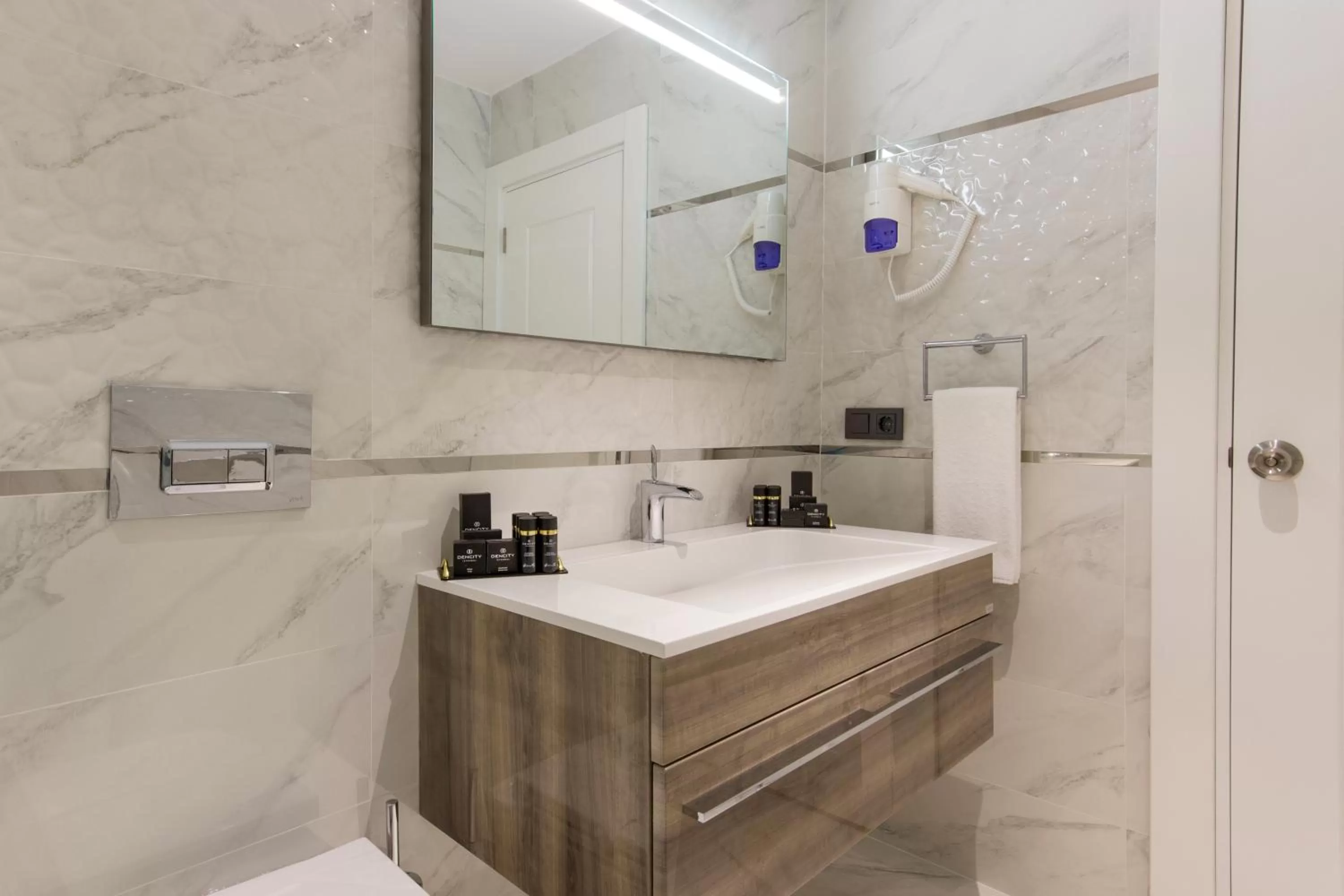 Bathroom in Dencity Hotels & Spa