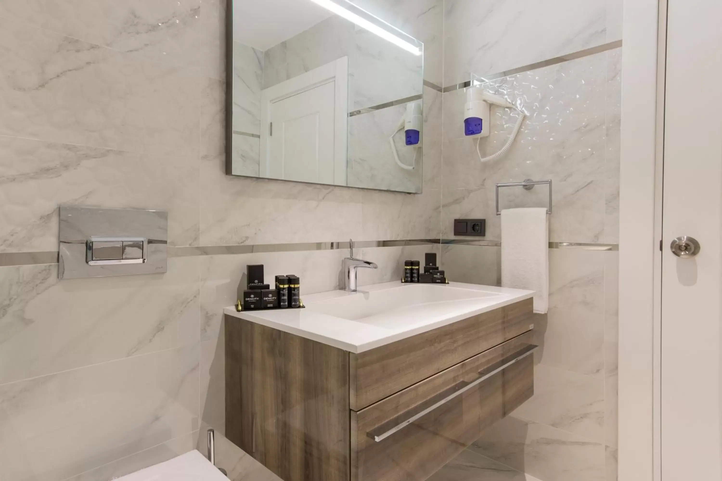 Bathroom in Dencity Hotels & Spa Bathroom in Dencity Hotels & Spa