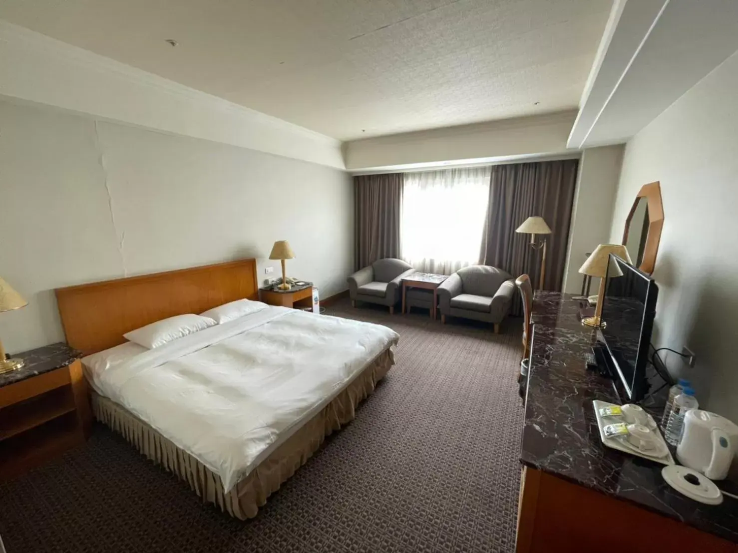 Photo of the whole room, Bed in Chuto Plaza Hotel