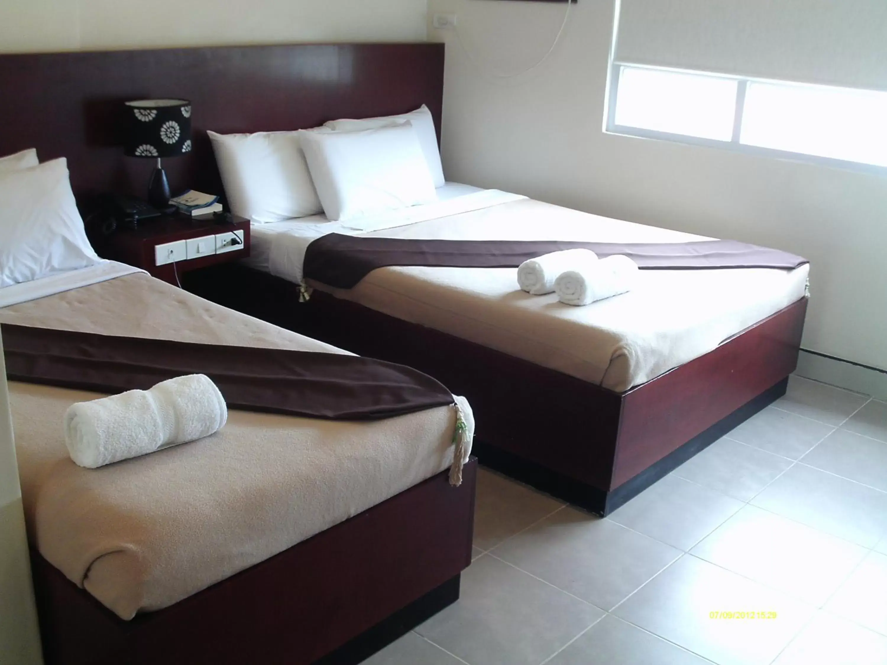 Bed in Grande Vista Hotel