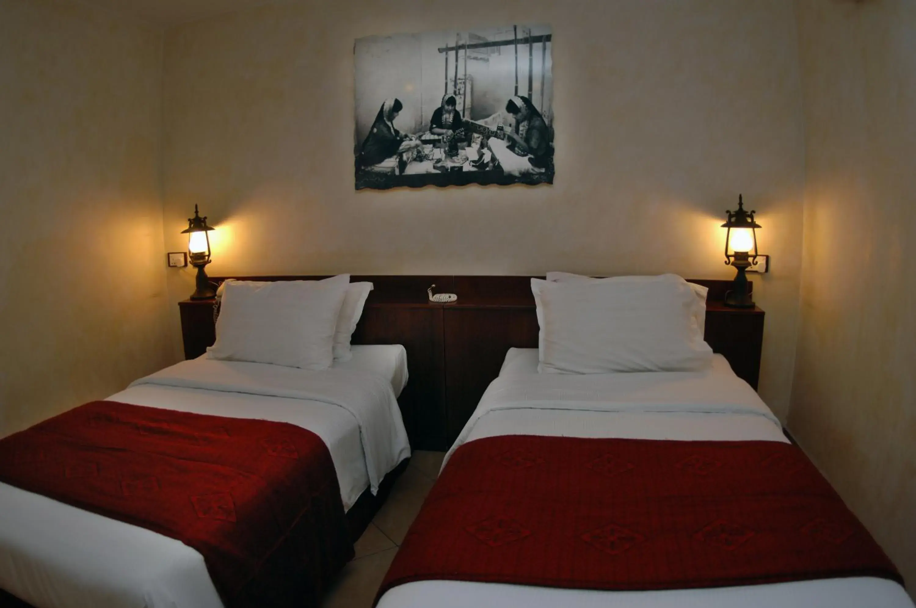 Bed in Al Liwan Suites