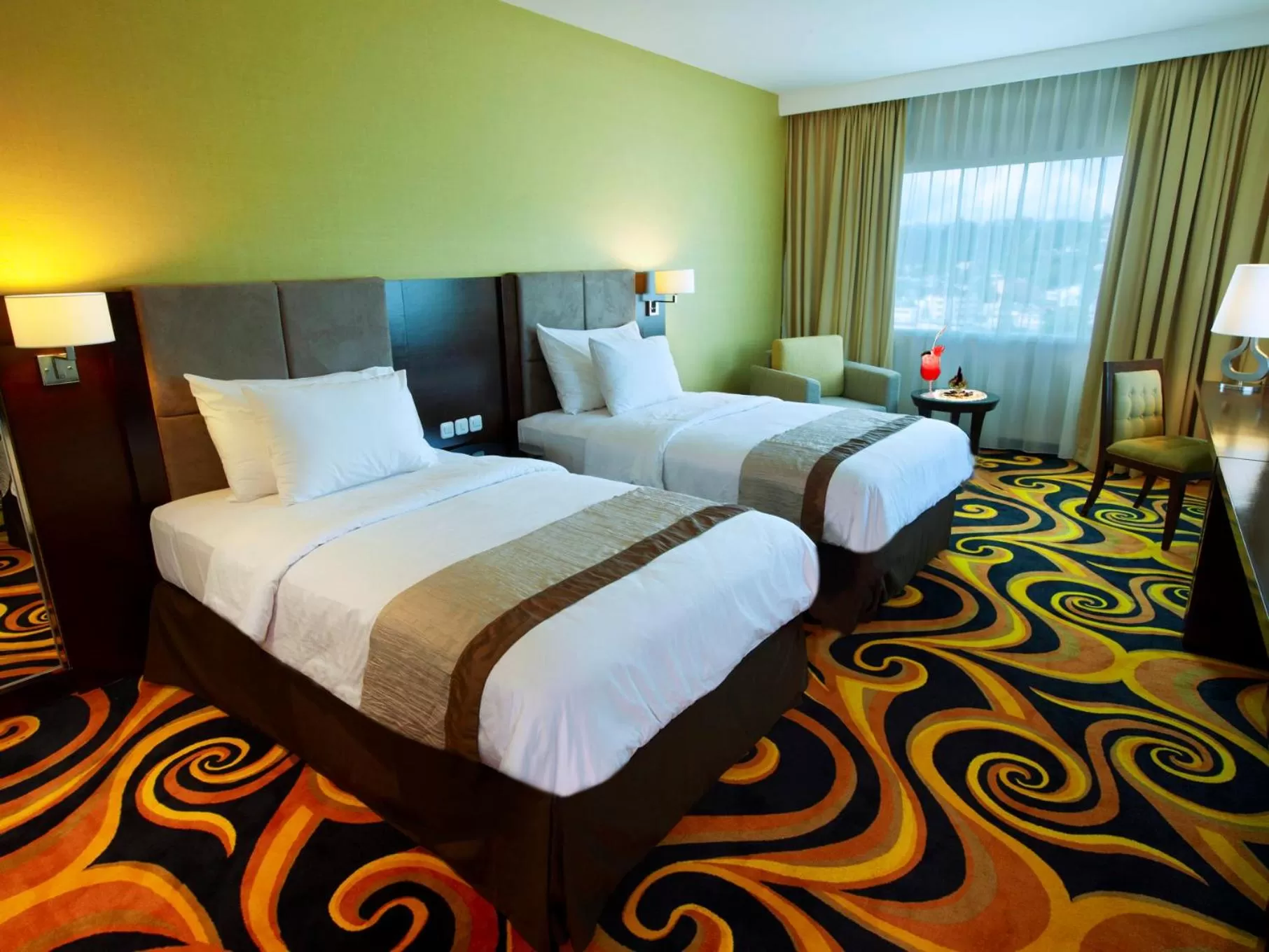 Bed in Swiss-Belhotel Ambon