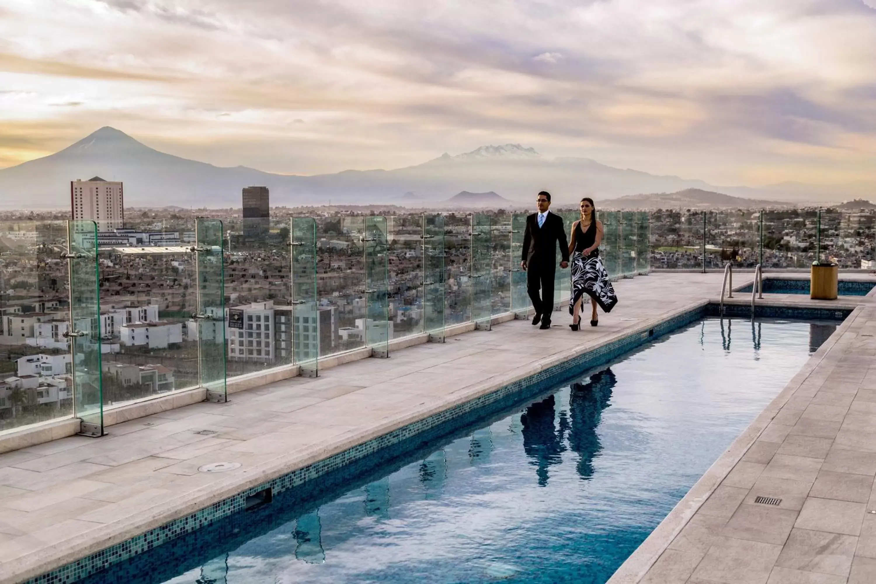 Swimming pool in Holiday Inn Express & Suites Puebla Angelopolis, an IHG Hotel