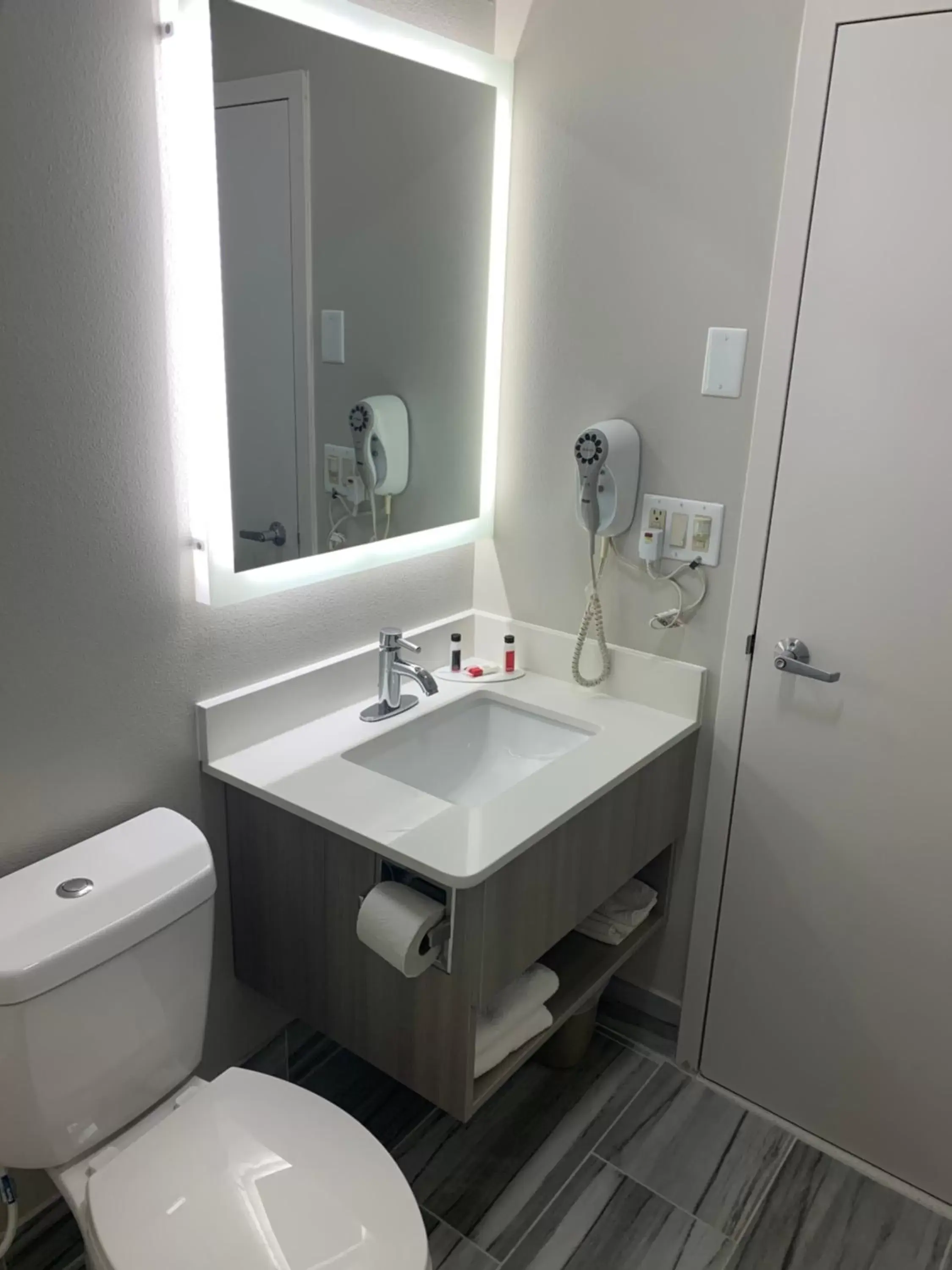 Bathroom in Microtel Inn by Wyndham Charlotte Airport