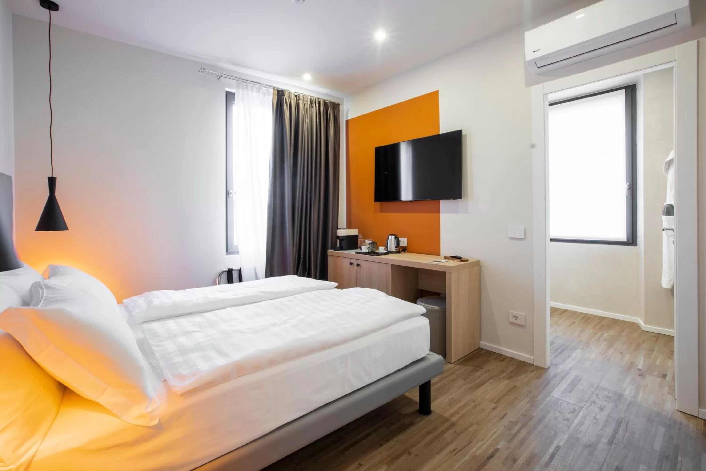 Bed in Ah Villaglori Boutique Apartments