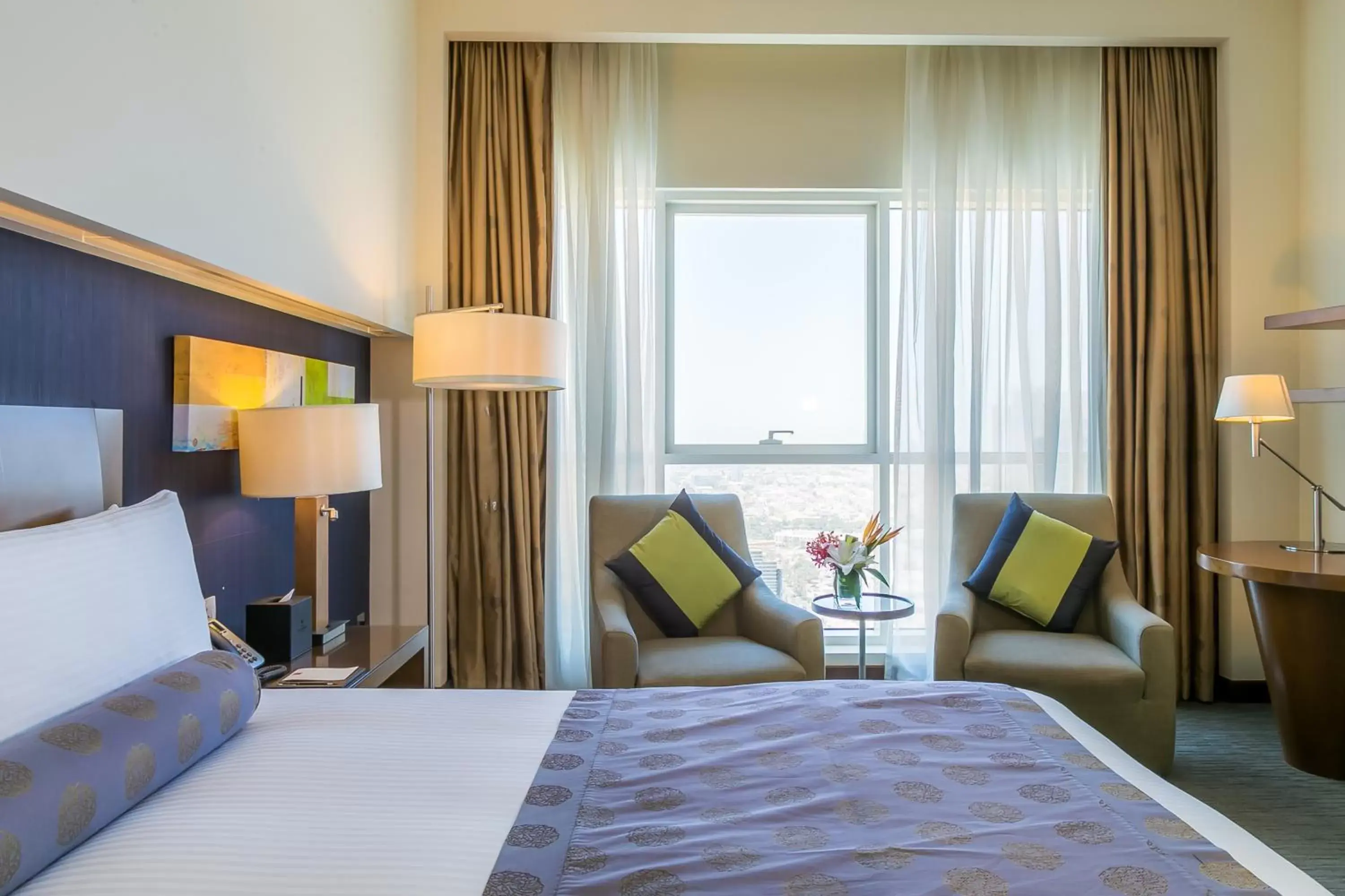 Bed in Grand Millennium Al Wahda Hotel and Executive Apartments Abu Dhabi