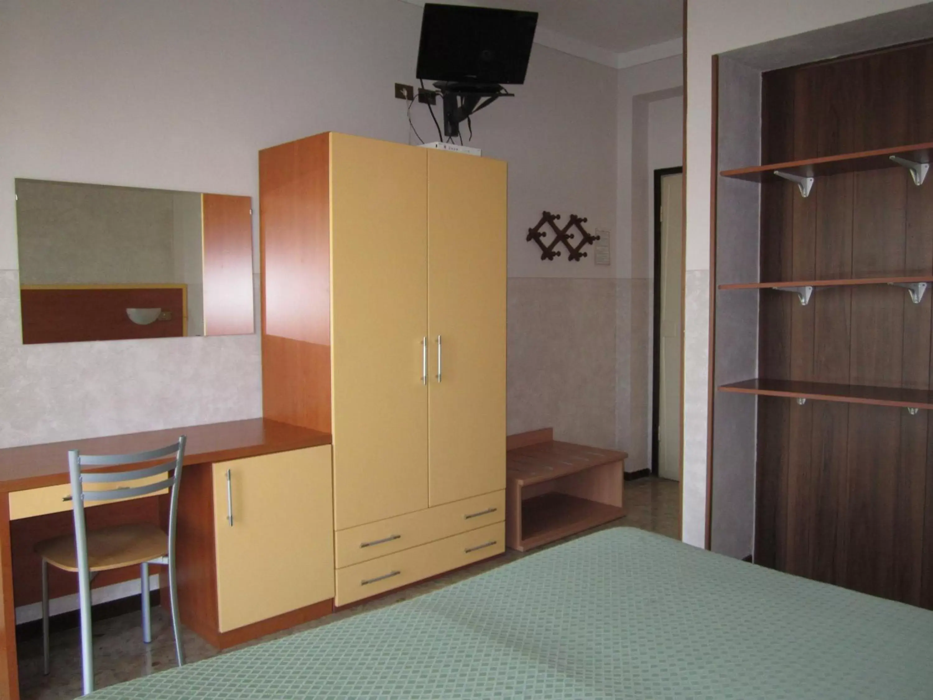 Bedroom, TV/Entertainment Center in Hotel Marchina