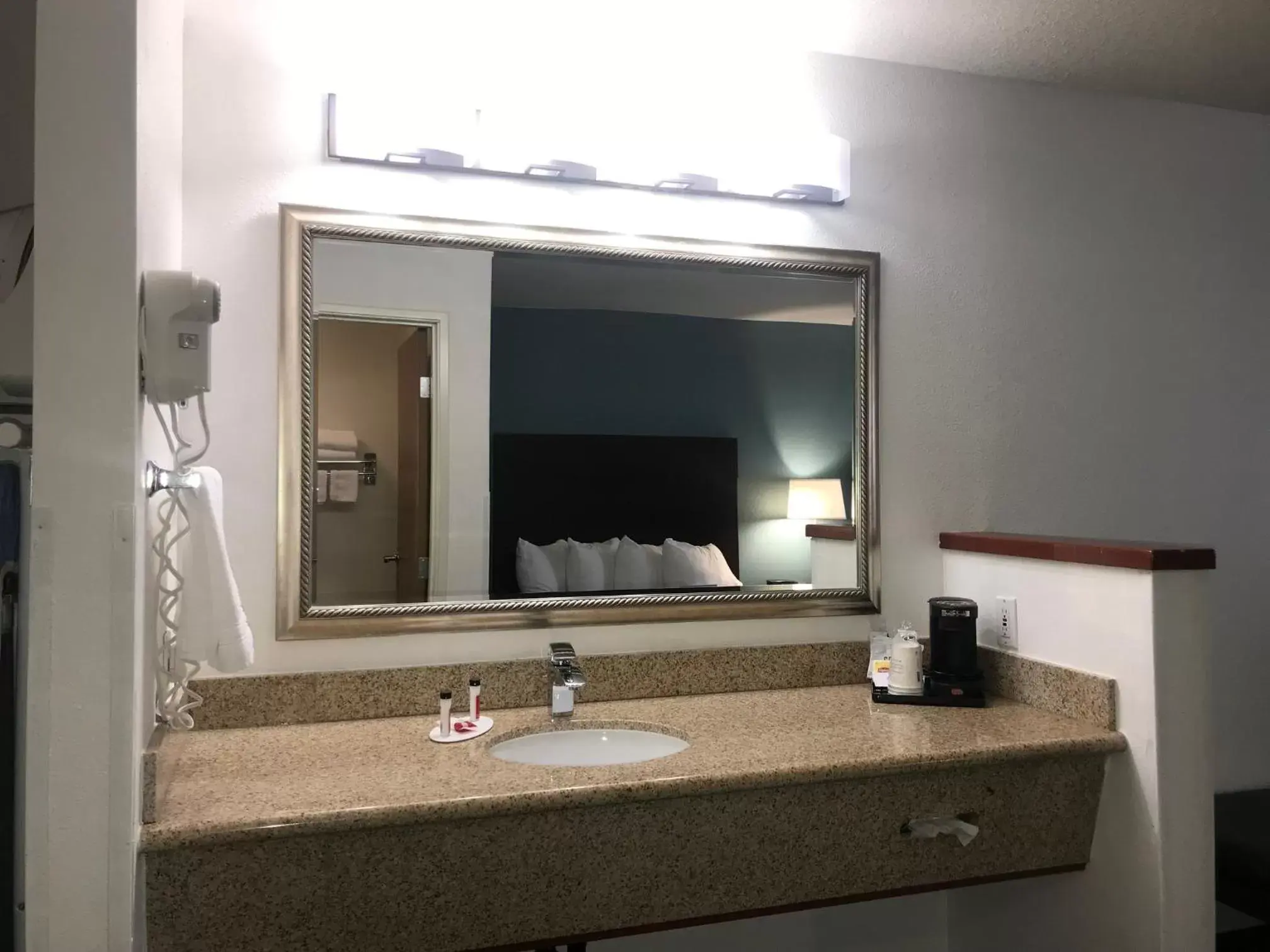 Bathroom in Days Inn & Suites by Wyndham Gresham