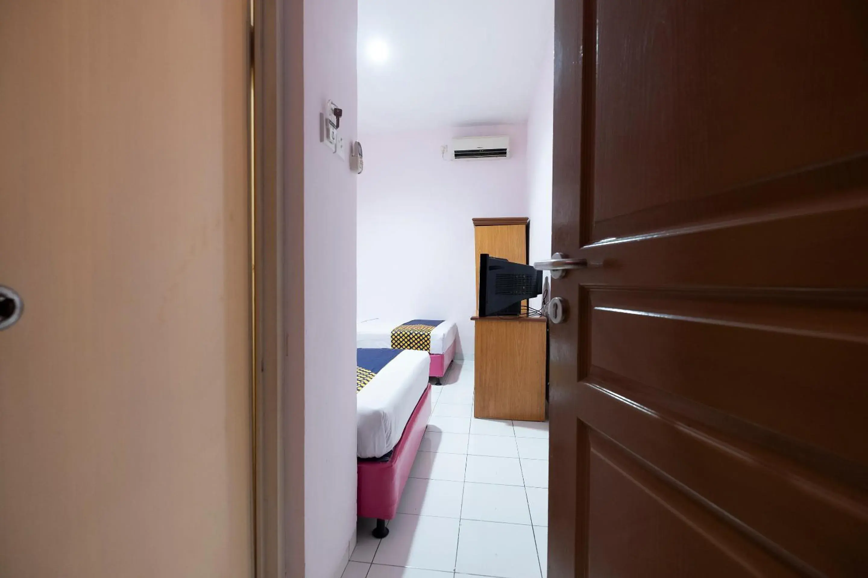 Bedroom in SPOT ON 2214 Wisma Jampea