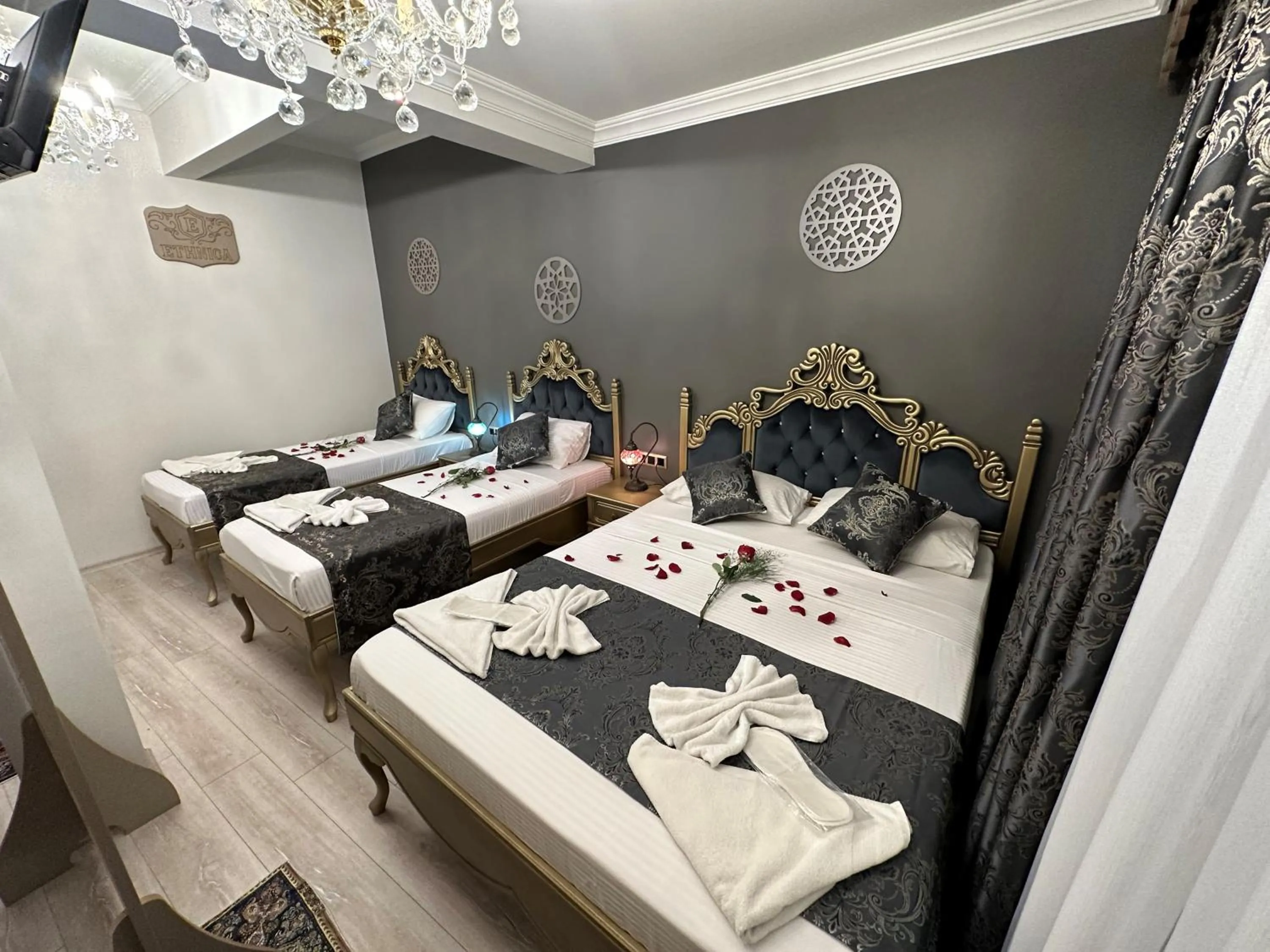 Bed in Ethnica Suites