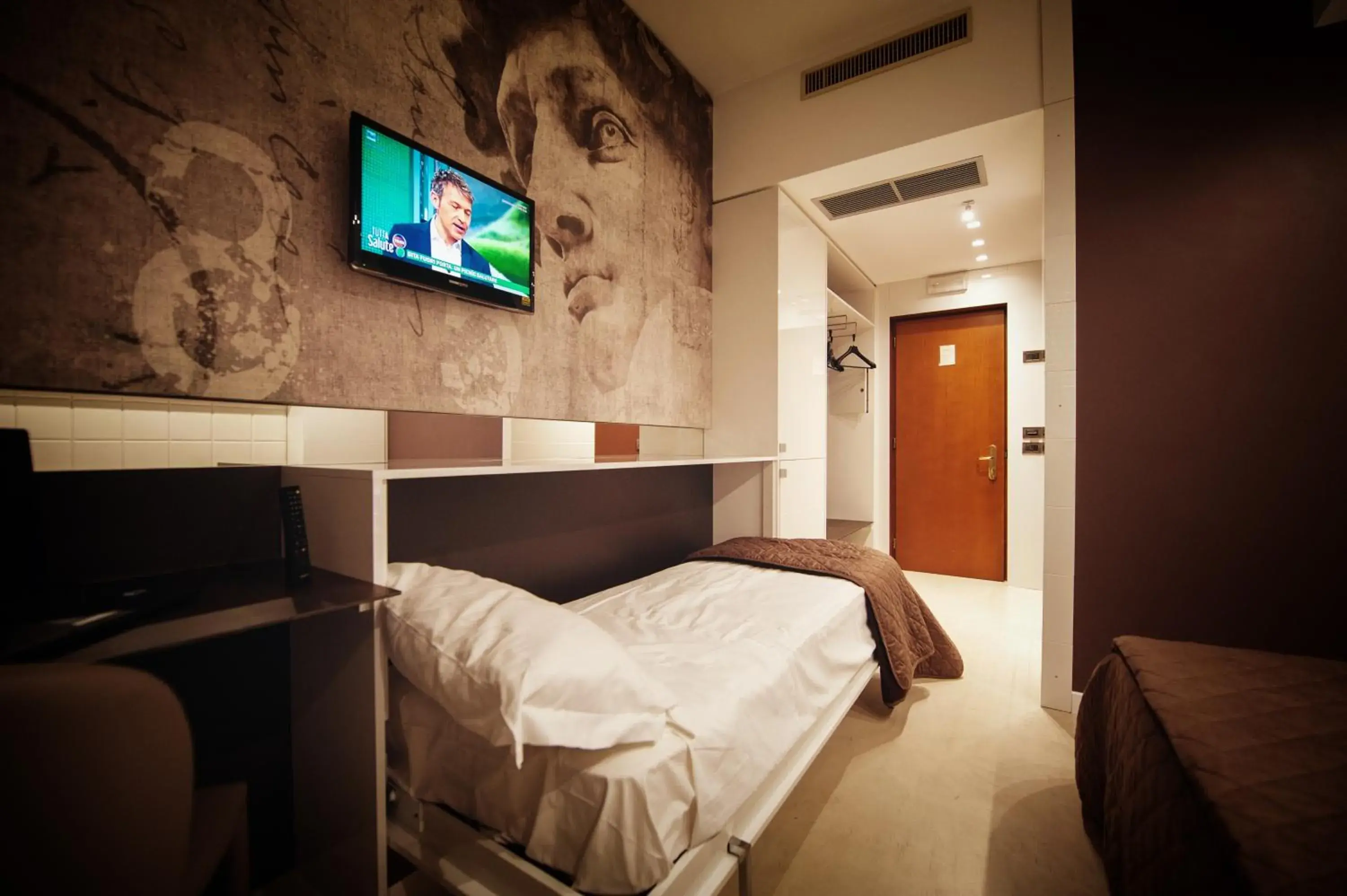 Bed in Gran Paradiso Hotel Spa